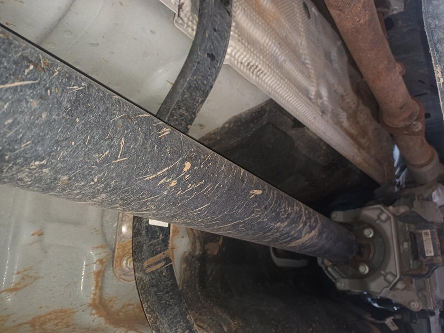 A Close Up of the Underside of a Car Showing the Exhaust Pipe — South West 4WD Wreckers In Brisbane, QLD