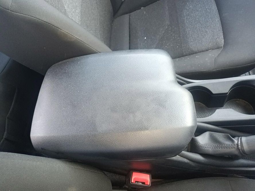 A Car Arm Rest with a Red Button on It — South West 4WD Wreckers In Brisbane, QLD