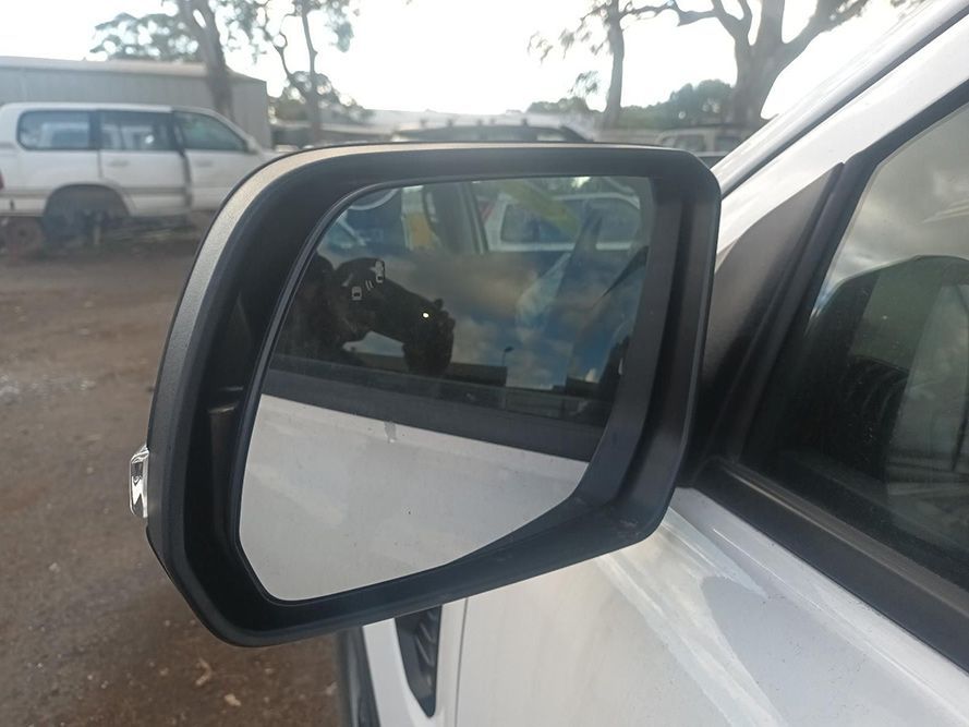 A Close Up of a Side View Mirror on a White Car — South West 4WD Wreckers In Brisbane, QLD