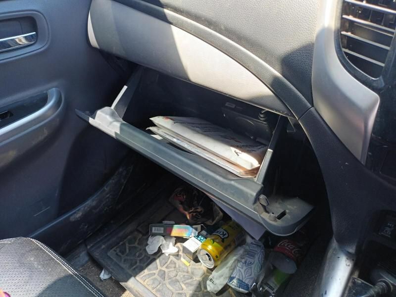 A Dirty Glove Box in a Car With a Lot of Trash in It — South West 4WD Wreckers In Brisbane, QLD