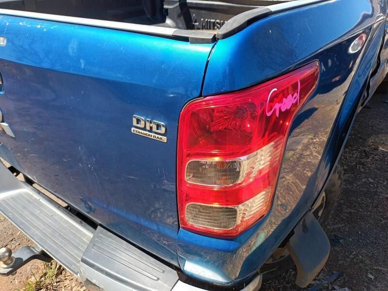 The Back End of a Blue Pickup Truck With a Red Tail Light — South West 4WD Wreckers In Brisbane, QLD