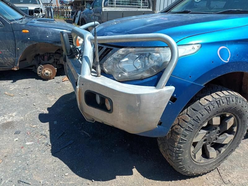 A Blue Truck With a Bumper on It is Parked in a Parking Lot — South West 4WD Wreckers In Brisbane, QLD