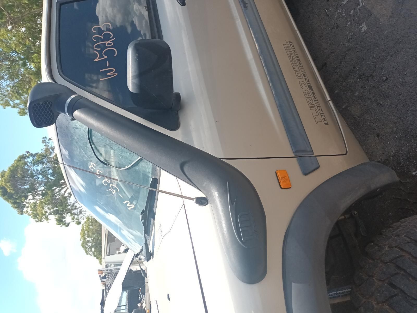 A Car with a Snorkel is Parked on the Side of the Road — South West 4WD Wreckers In Brisbane, QLD