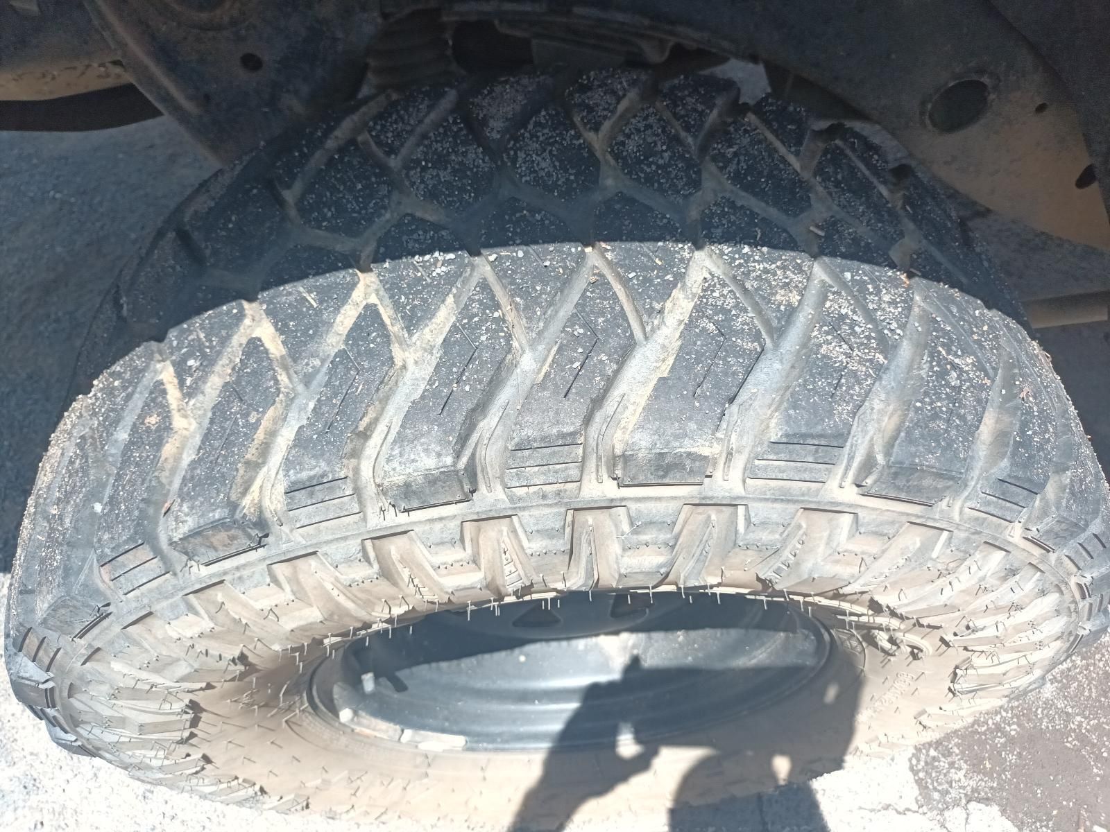 A Close Up of a Tire with a Shadow on the Ground — South West 4WD Wreckers In Brisbane, QLD