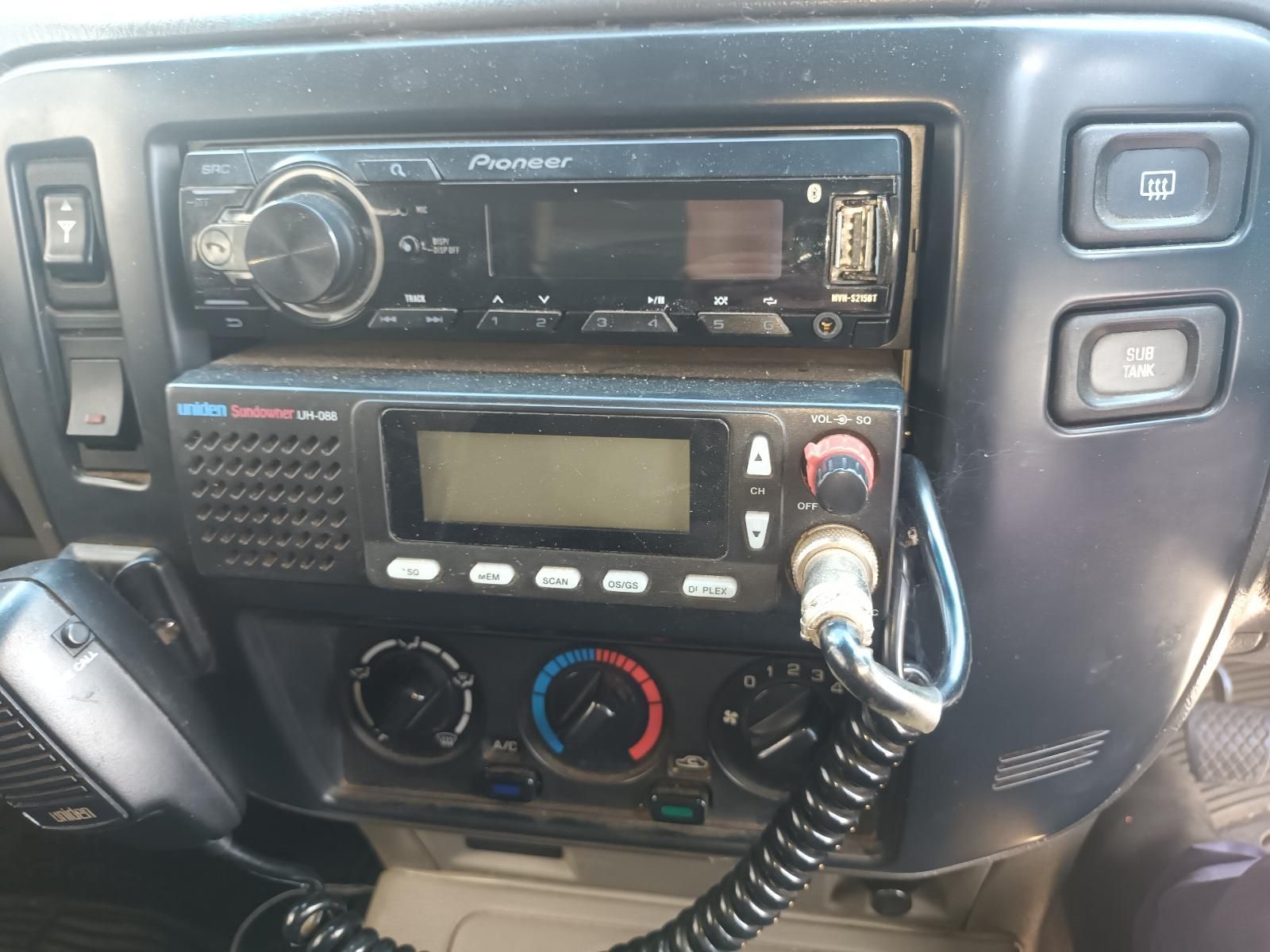 A Pioneer Radio is Sitting on the Dashboard of a Car — South West 4WD Wreckers In Brisbane, QLD