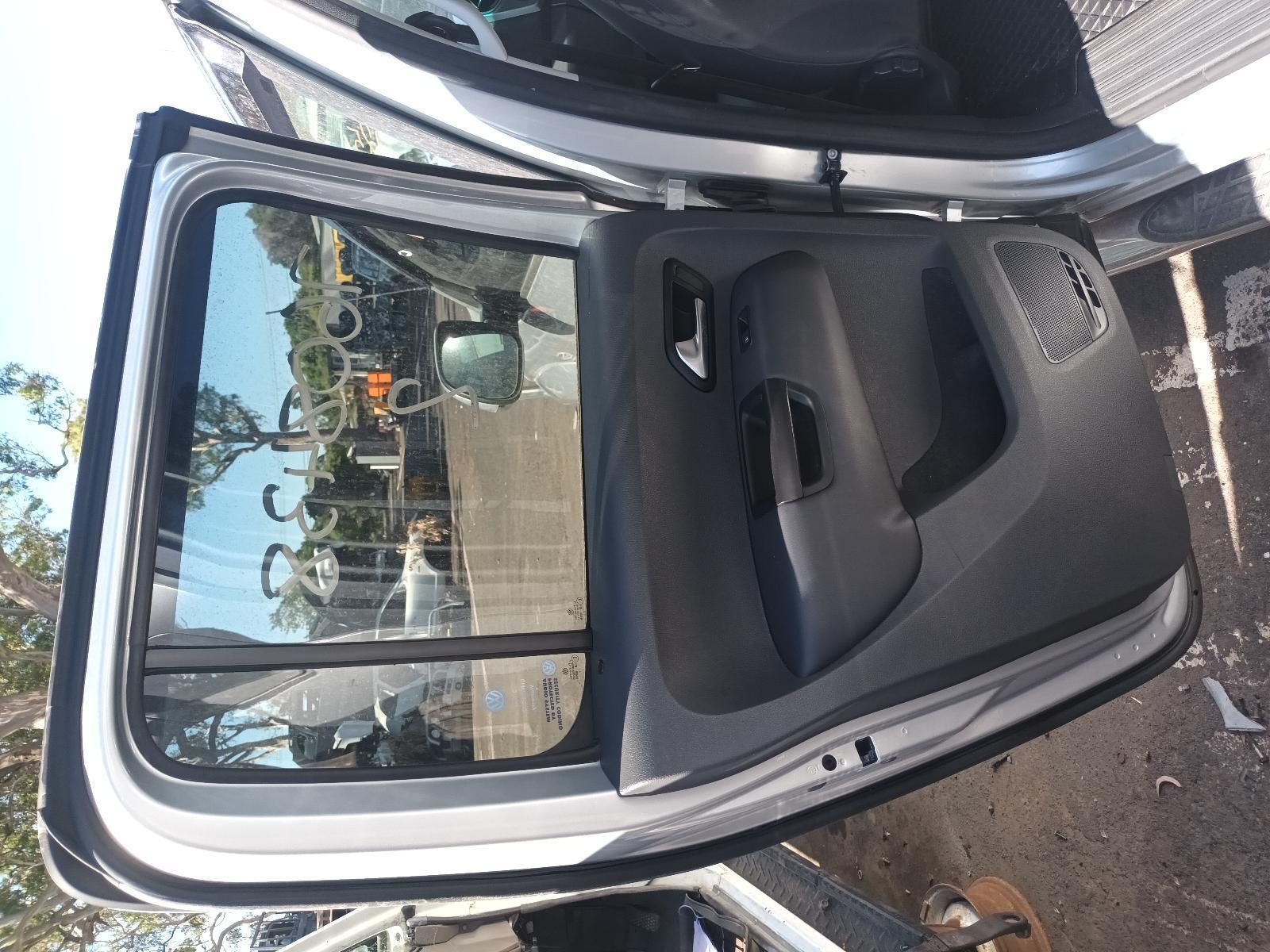 The Back Door of a Silver Car is Open — South West 4WD Wreckers In Brisbane, QLD