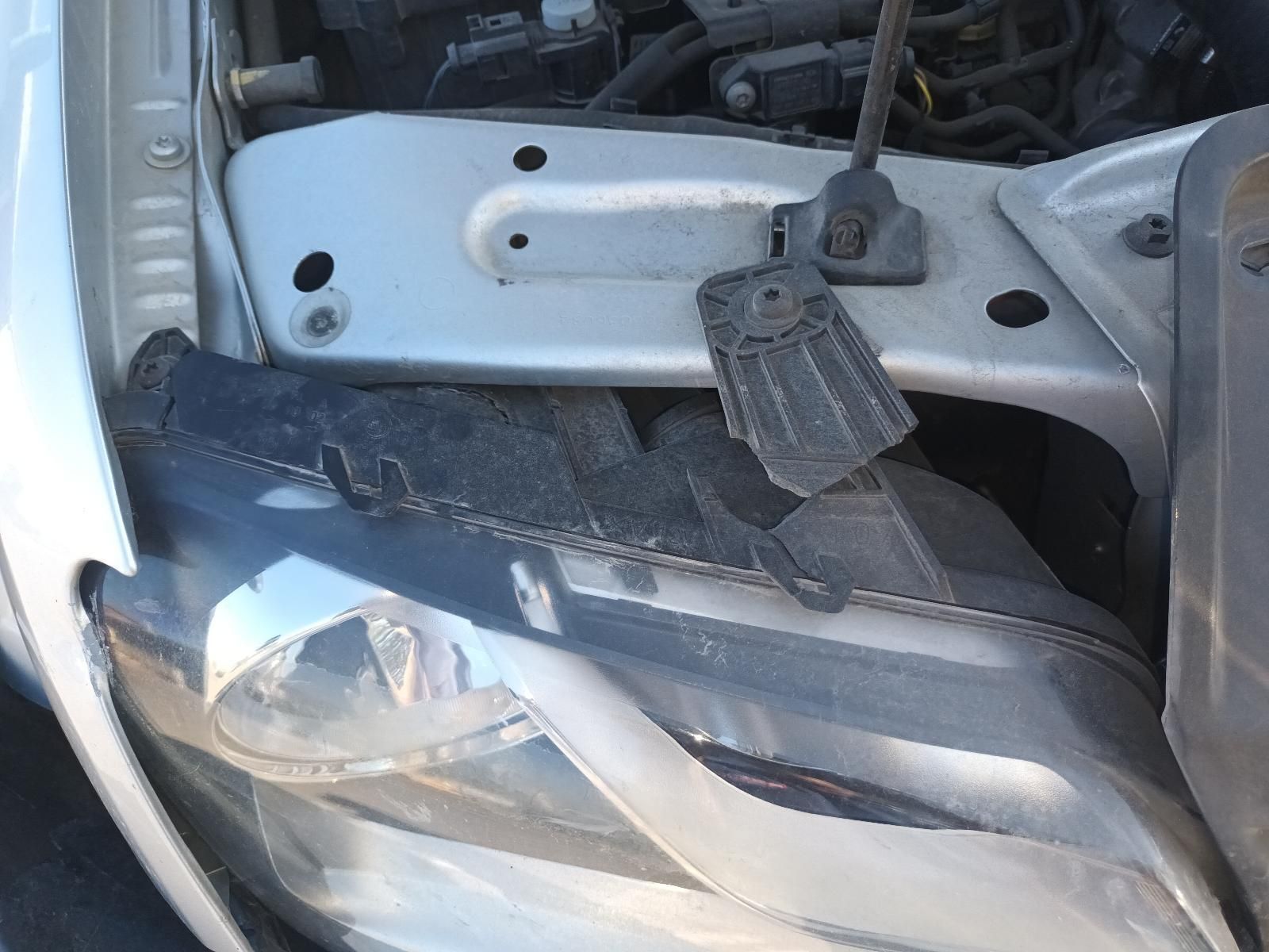 A Close Up of a Car's Headlight with the Hood Open— South West 4WD Wreckers In Brisbane, QLD