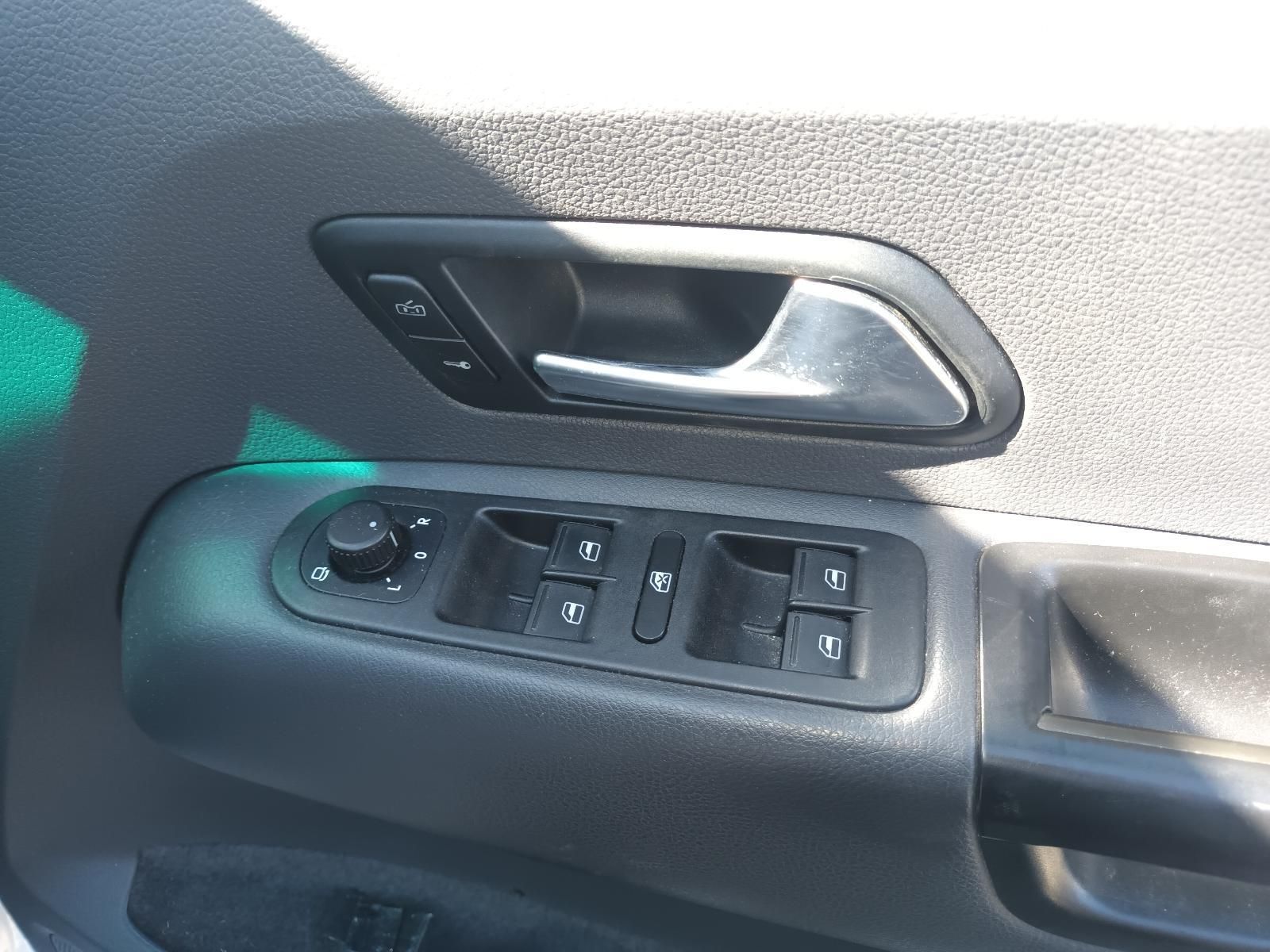 A Close Up of a Car Door with a Window Switch — South West 4WD Wreckers In Brisbane, QLD