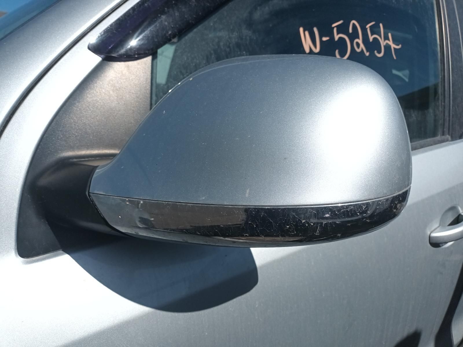 A Silver Car with a Side Mirror — South West 4WD Wreckers In Brisbane, QLD