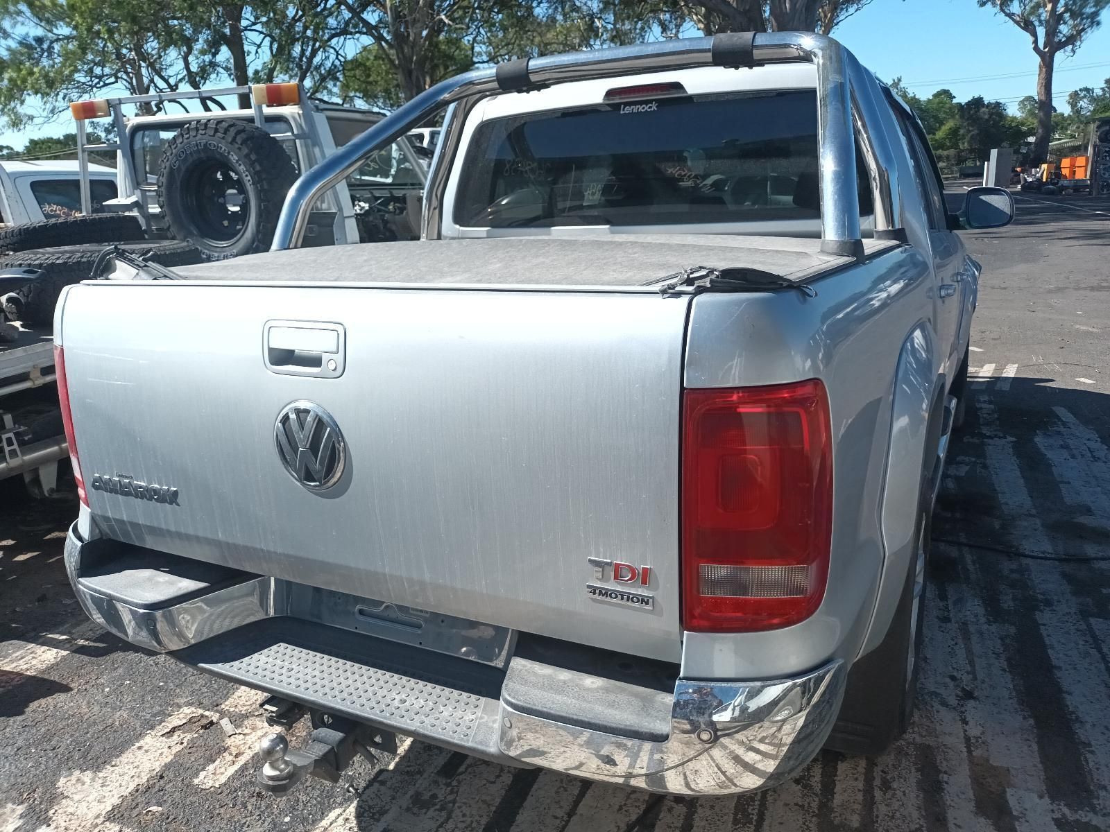 A Silver Volkswagen Amarok is Parked in a Parking Lot — South West 4WD Wreckers In Brisbane, QLD