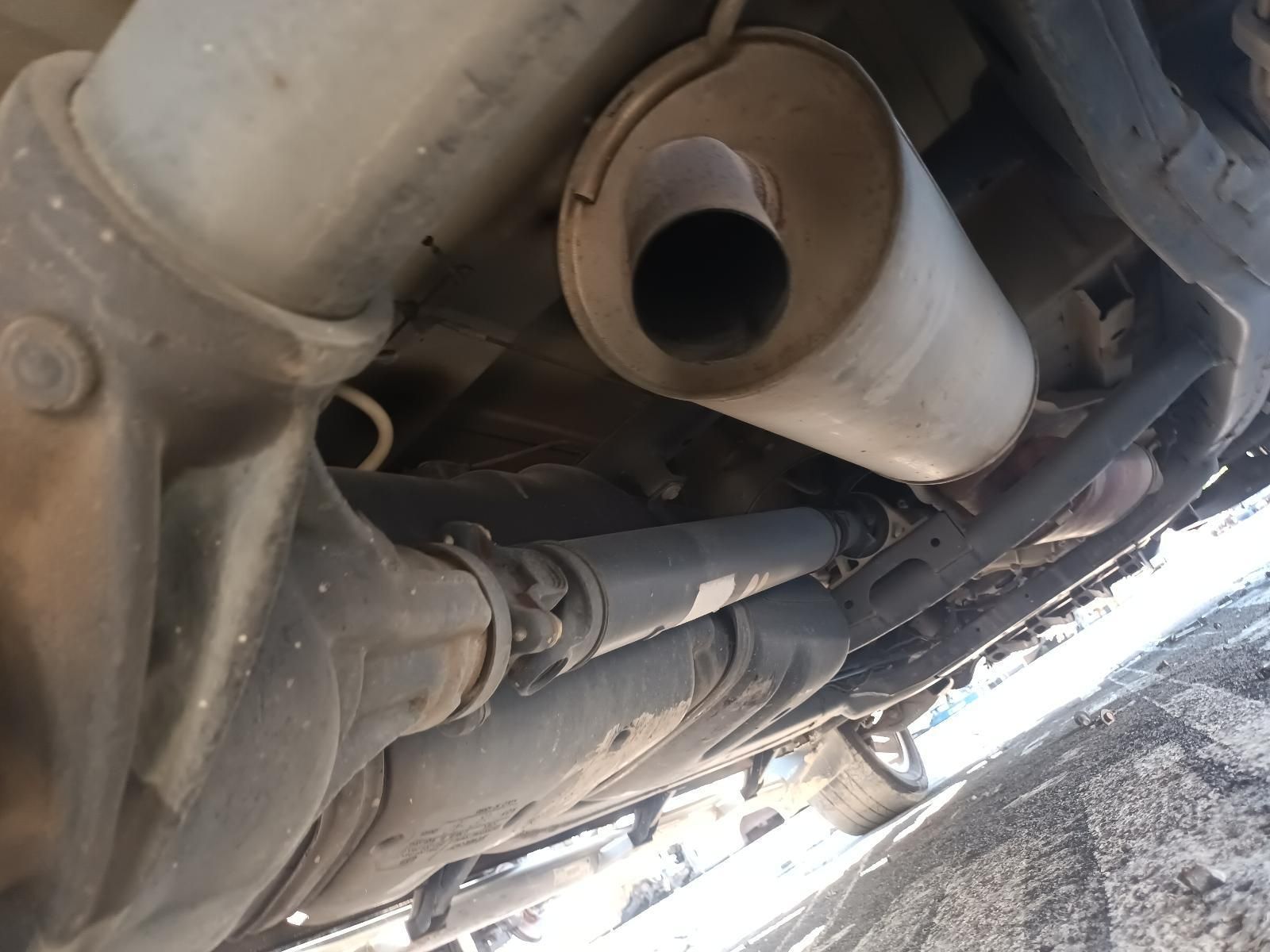 A Close Up of a Car Exhaust Pipe Underneath It — South West 4WD Wreckers In Brisbane, QLD