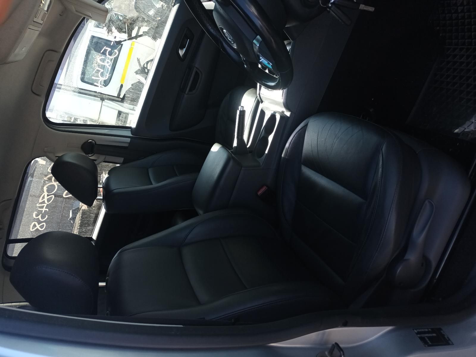 The Inside of a Silver Car with Black Leather Seats and a Steering Wheel — South West 4WD Wreckers In Brisbane, QLD