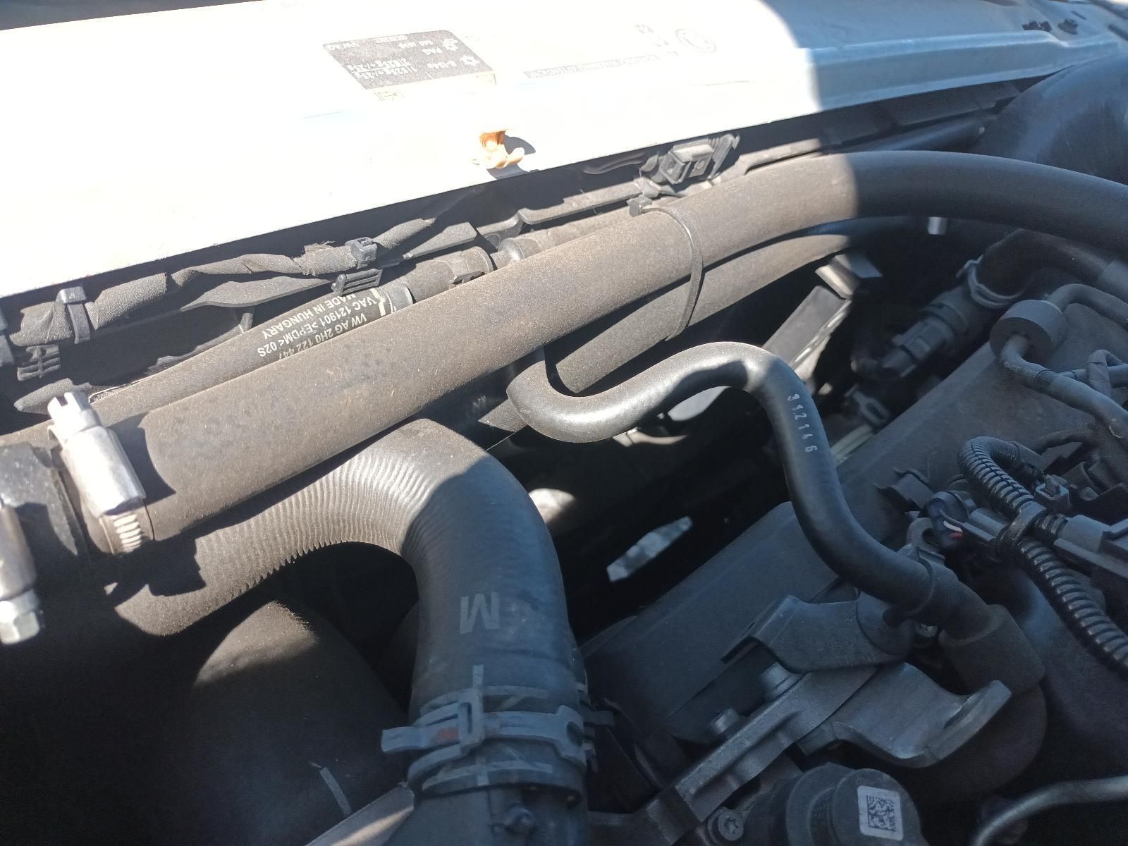 A Close Up of a Car Engine with a Hose — South West 4WD Wreckers In Brisbane, QLD