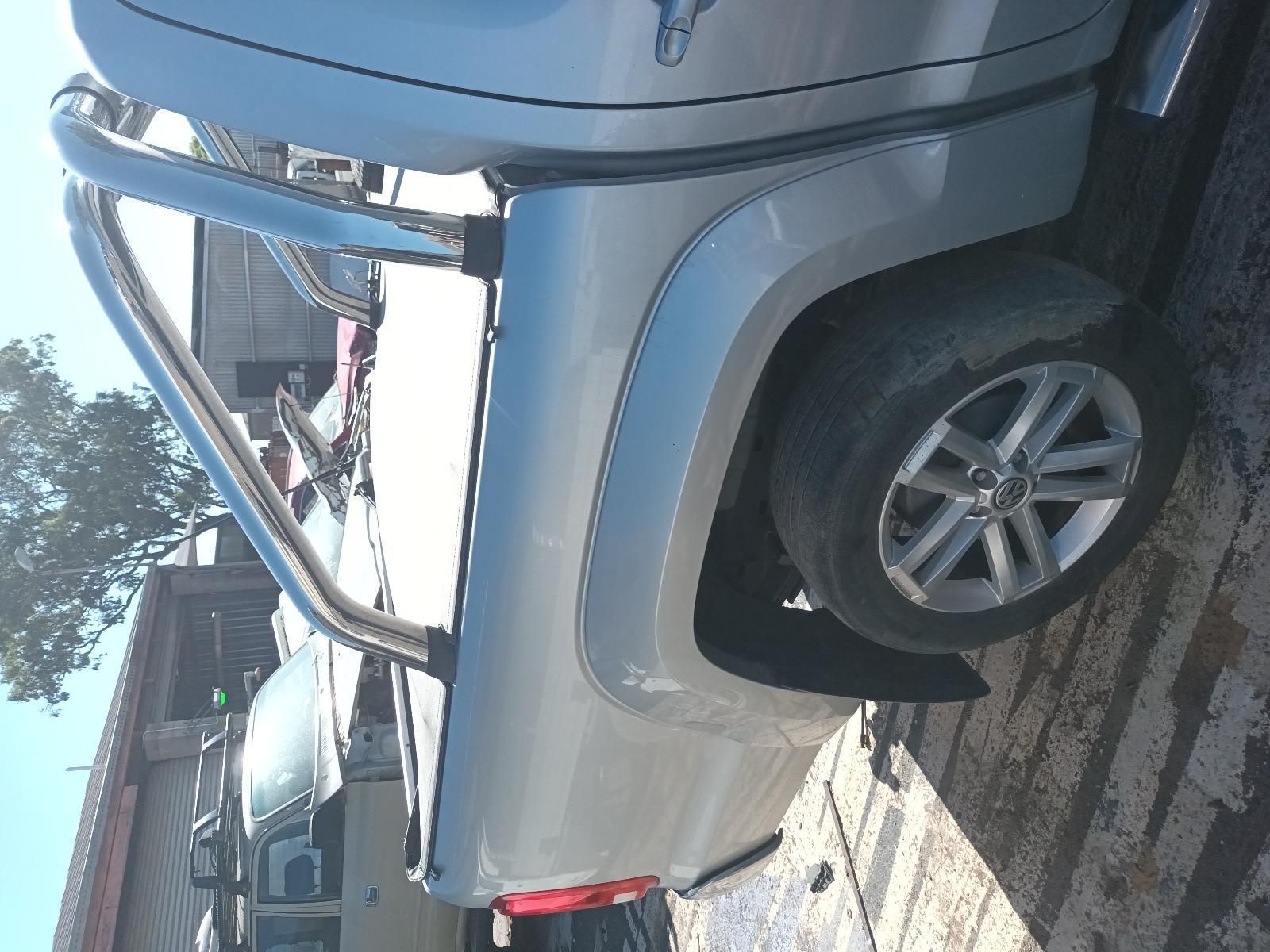 A Silver Truck is Parked on the Side of the Road — South West 4WD Wreckers In Brisbane, QLD