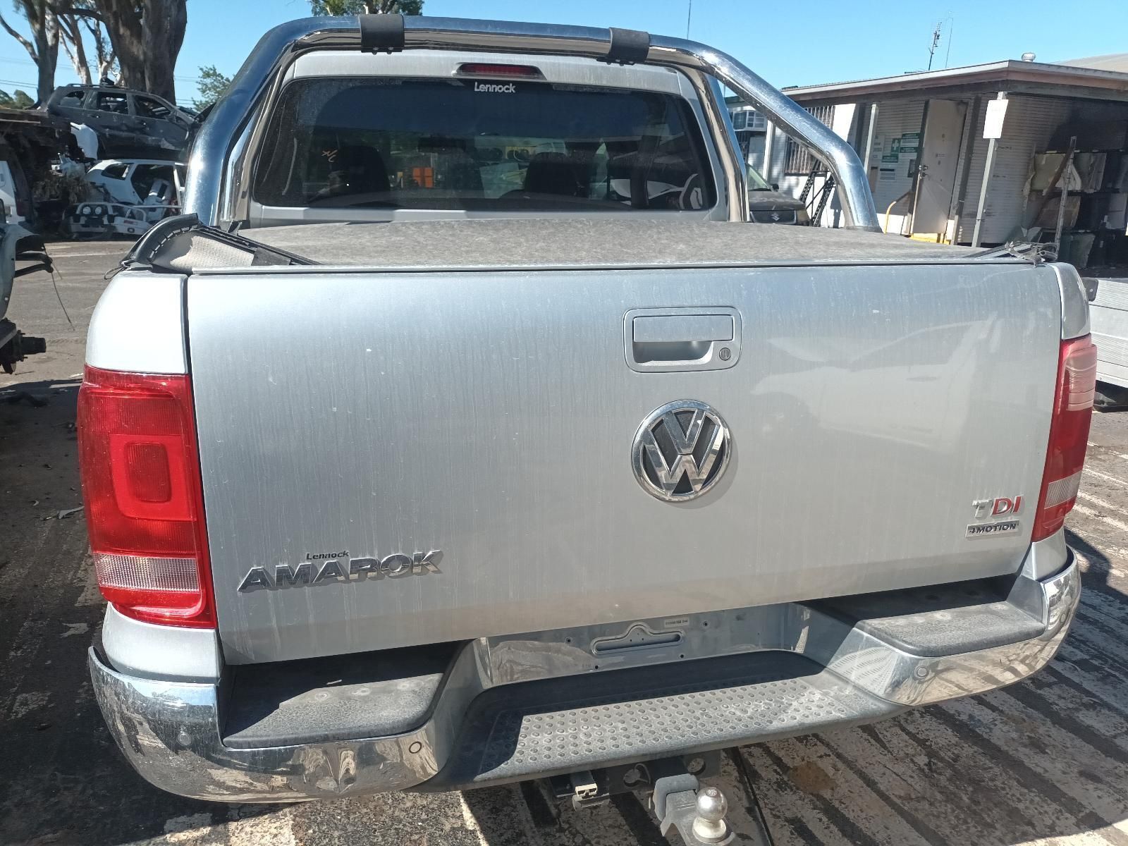 A Silver Volkswagen Amarok is Parked in a Parking Lot — South West 4WD Wreckers In Brisbane, QLD