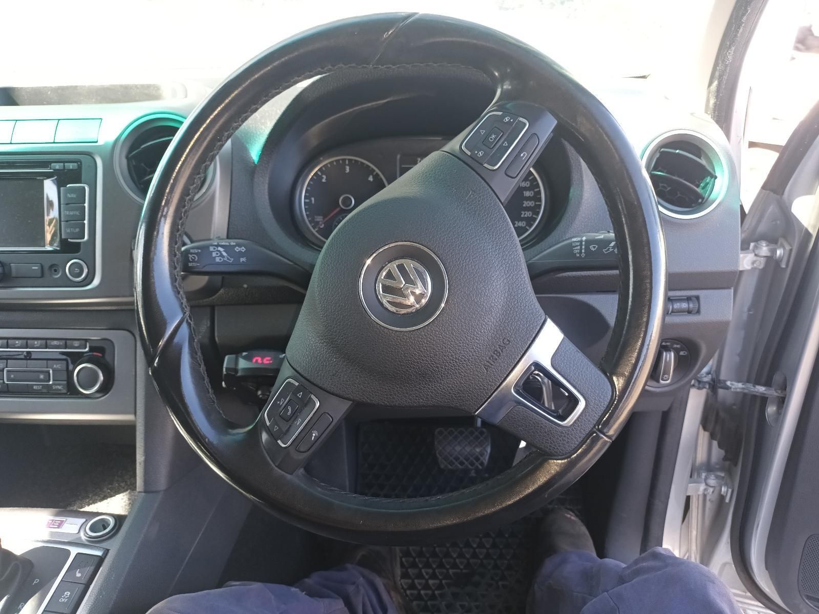 A Person is Sitting in the Driver's Seat of a Volkswagen Car — South West 4WD Wreckers In Brisbane, QLD