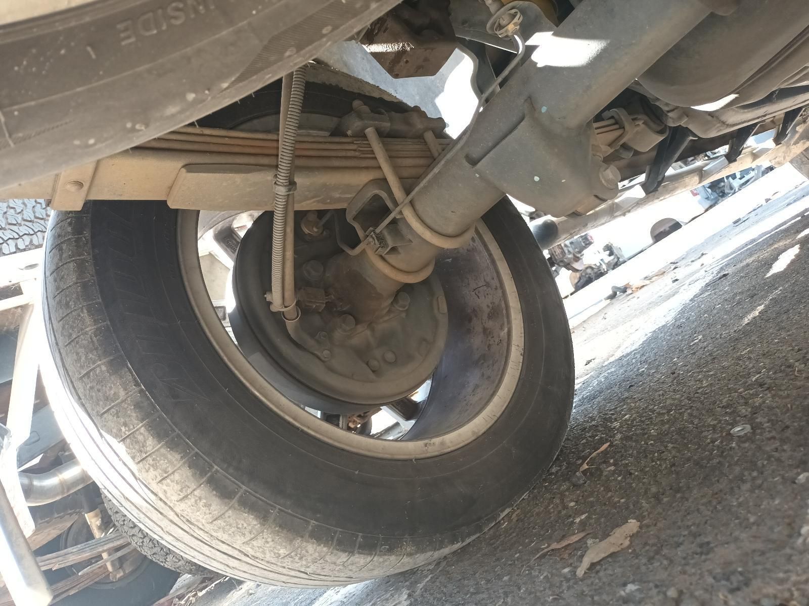 A Close Up of the Underside of a Car Showing the Tire — South West 4WD Wreckers In Brisbane, QLD