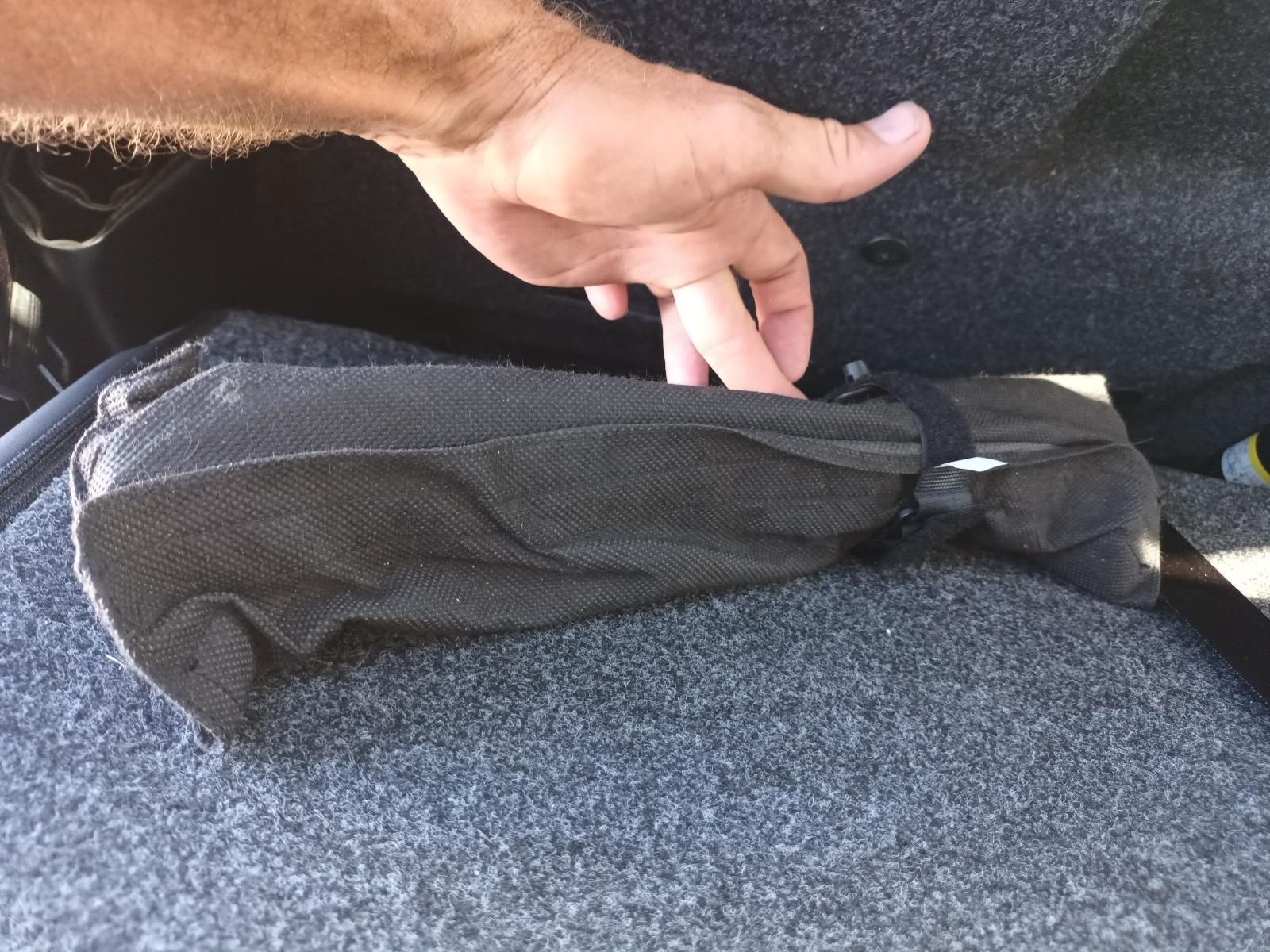 A Person is Holding a Black Object in Their Hand — South West 4WD Wreckers In Brisbane, QLD