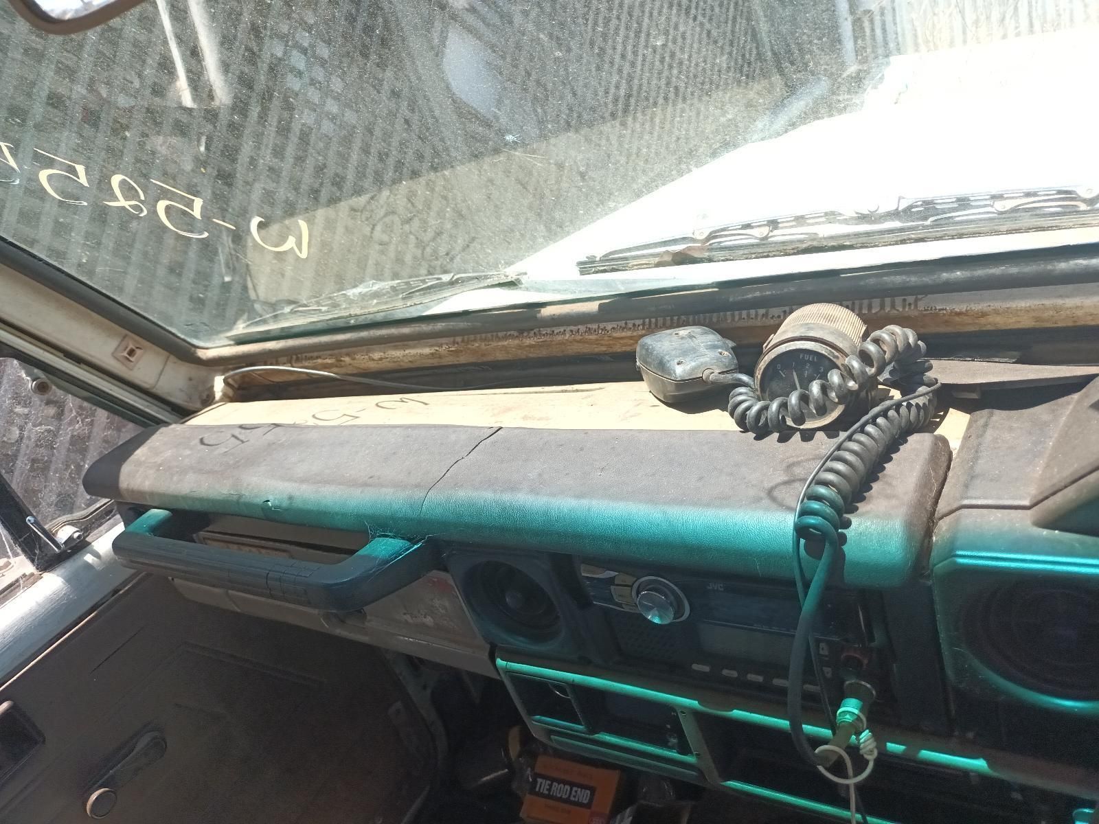 A Dirty Dashboard with a Microphone on It — South West 4WD Wreckers In Brisbane, QLD