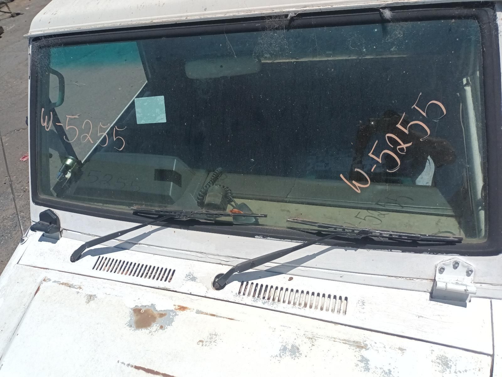 A White Jeep with a Windshield That Has a Wiper on It — South West 4WD Wreckers In Brisbane, QLD