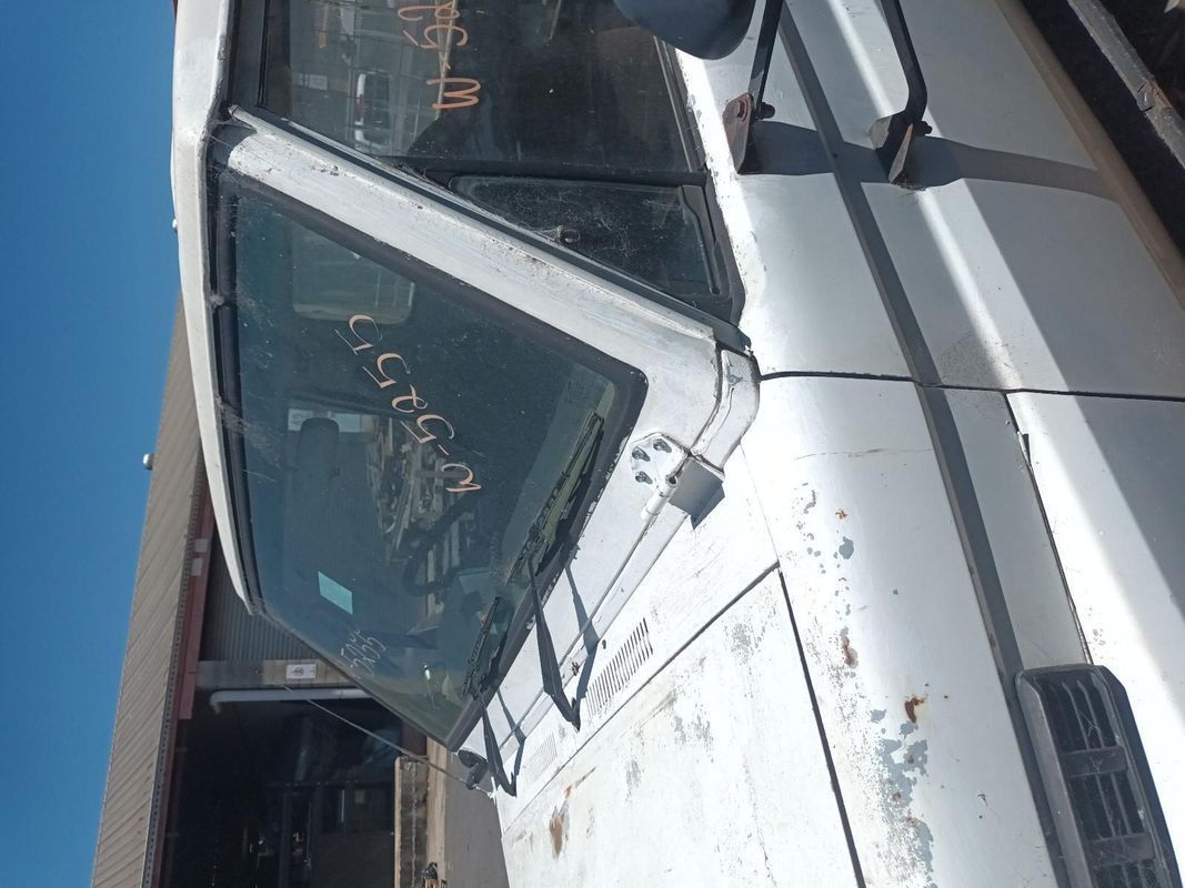 A White Truck with a Broken Windshield is Parked in a Parking Lot — South West 4WD Wreckers In Brisbane, QLD