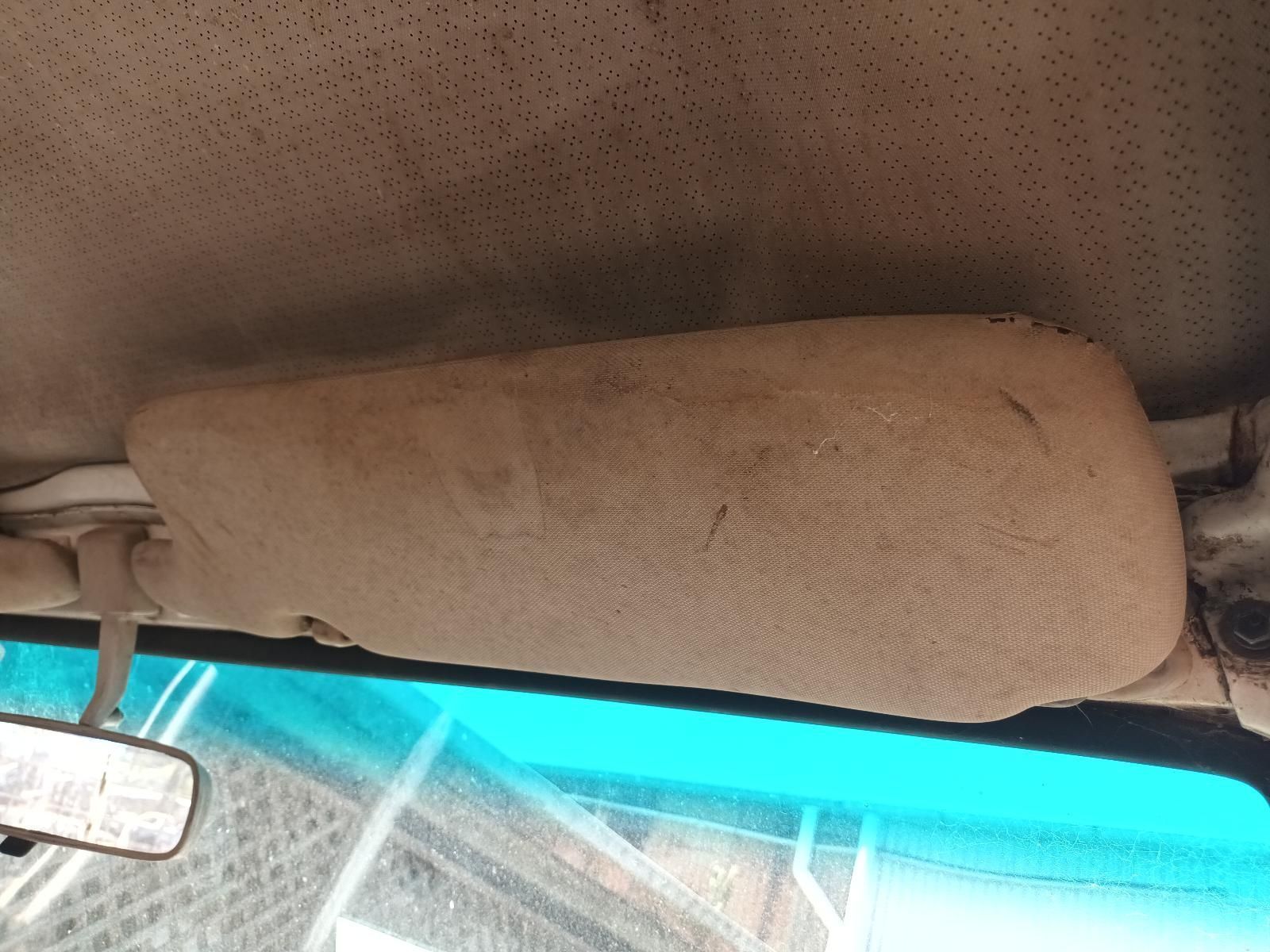 A Sun Visor is Hanging from the Ceiling of a Car — South West 4WD Wreckers In Brisbane, QLD
