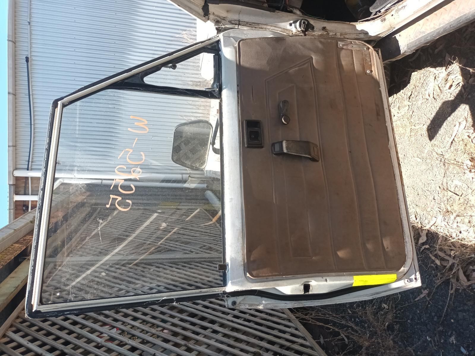 A Car Door with a Sticker on It — South West 4WD Wreckers In Brisbane, QLD