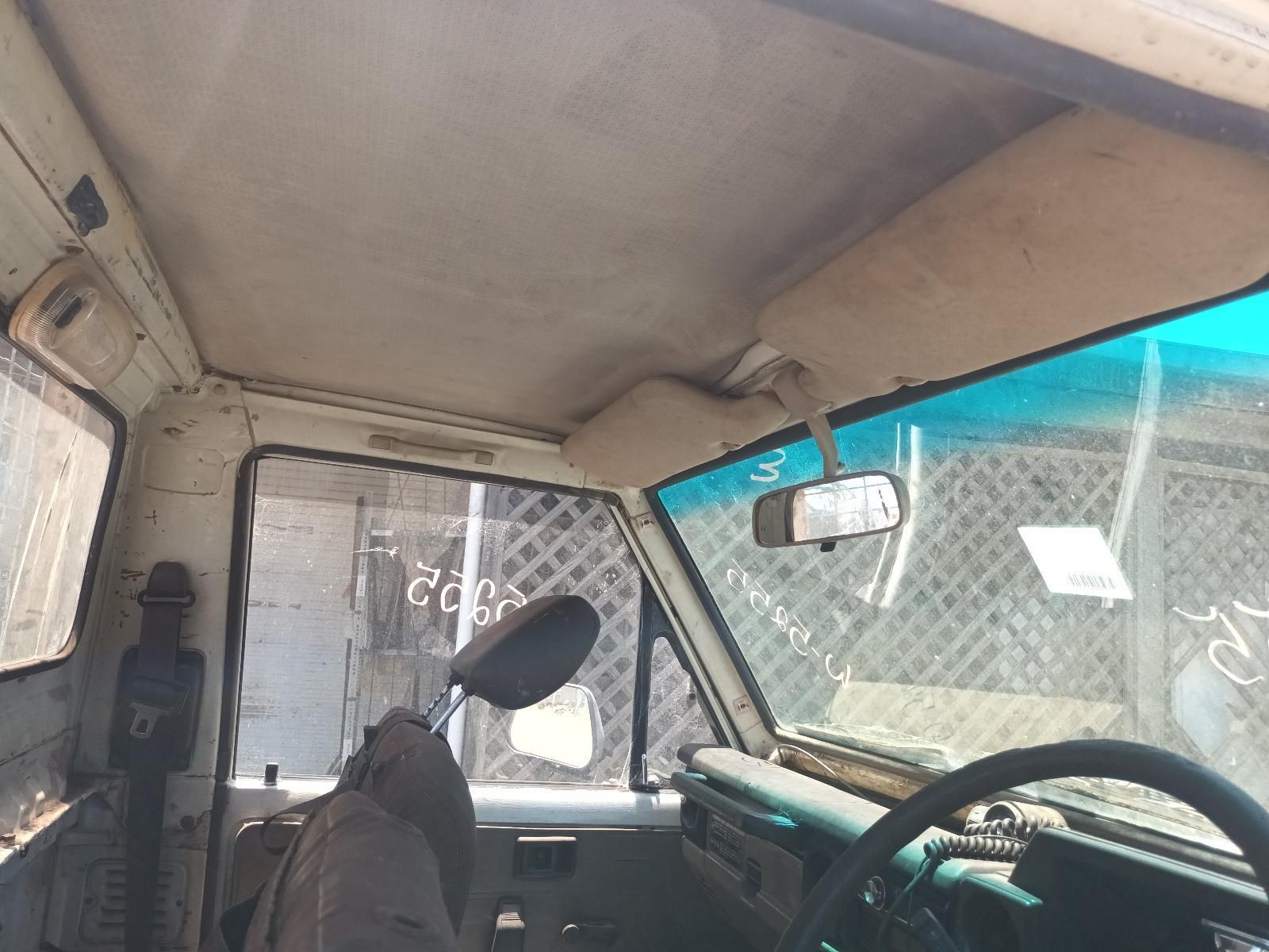 The Inside of a Car with a Steering Wheel and a Rear View Mirror — South West 4WD Wreckers In Brisbane, QLD
