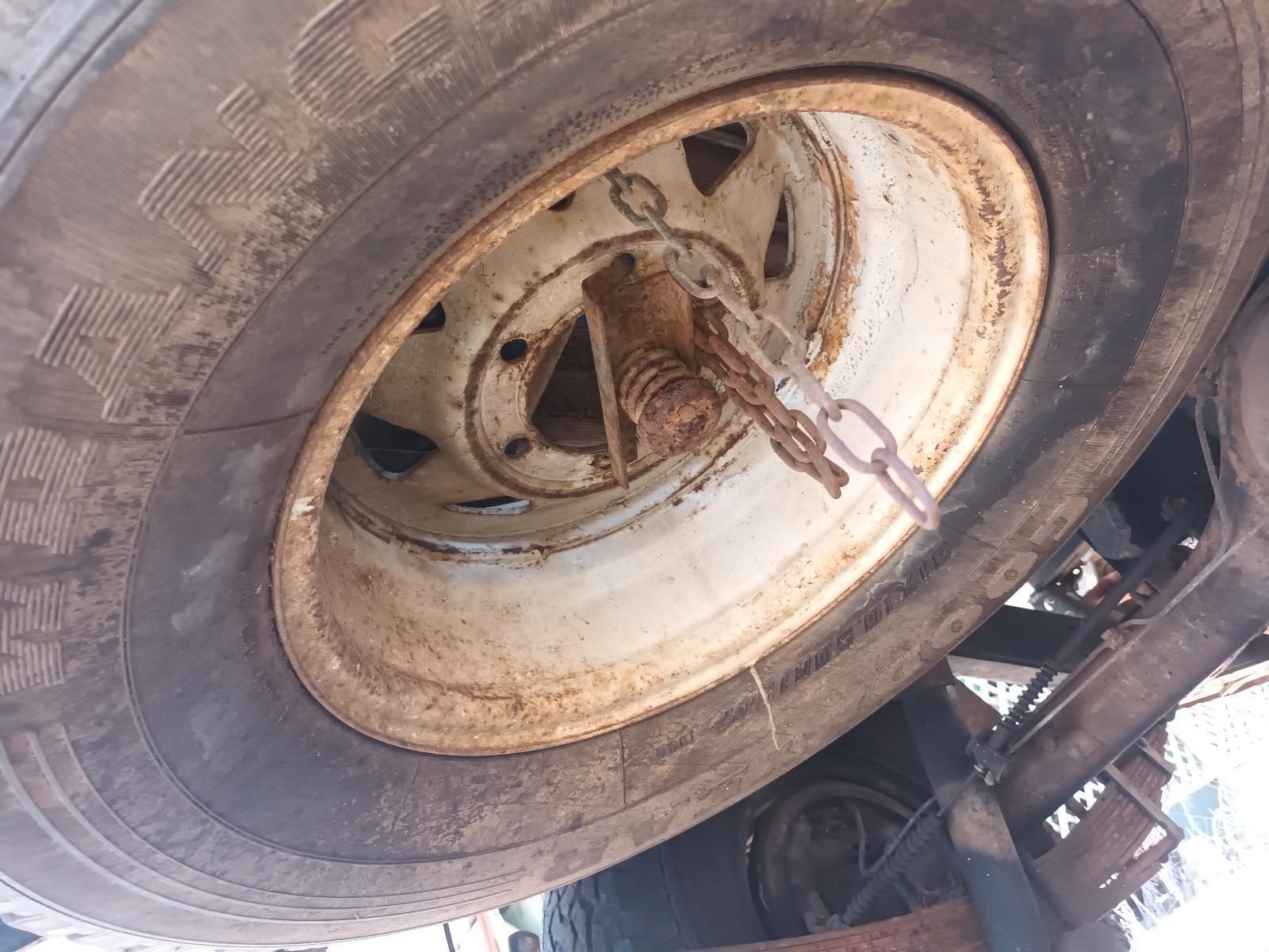 A Close Up of a Tire with a Chain Attached to It — South West 4WD Wreckers In Brisbane, QLD