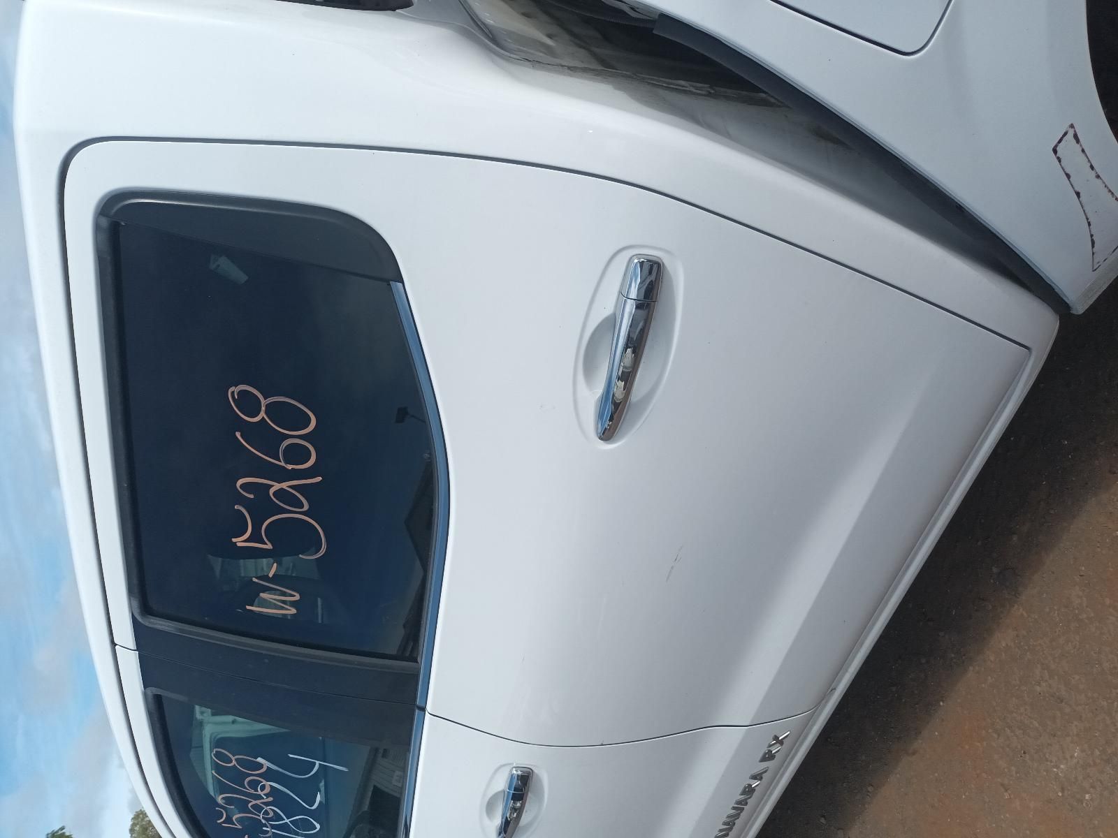 A White Car with the Numbers Written on It — South West 4WD Wreckers In Brisbane, QLD
