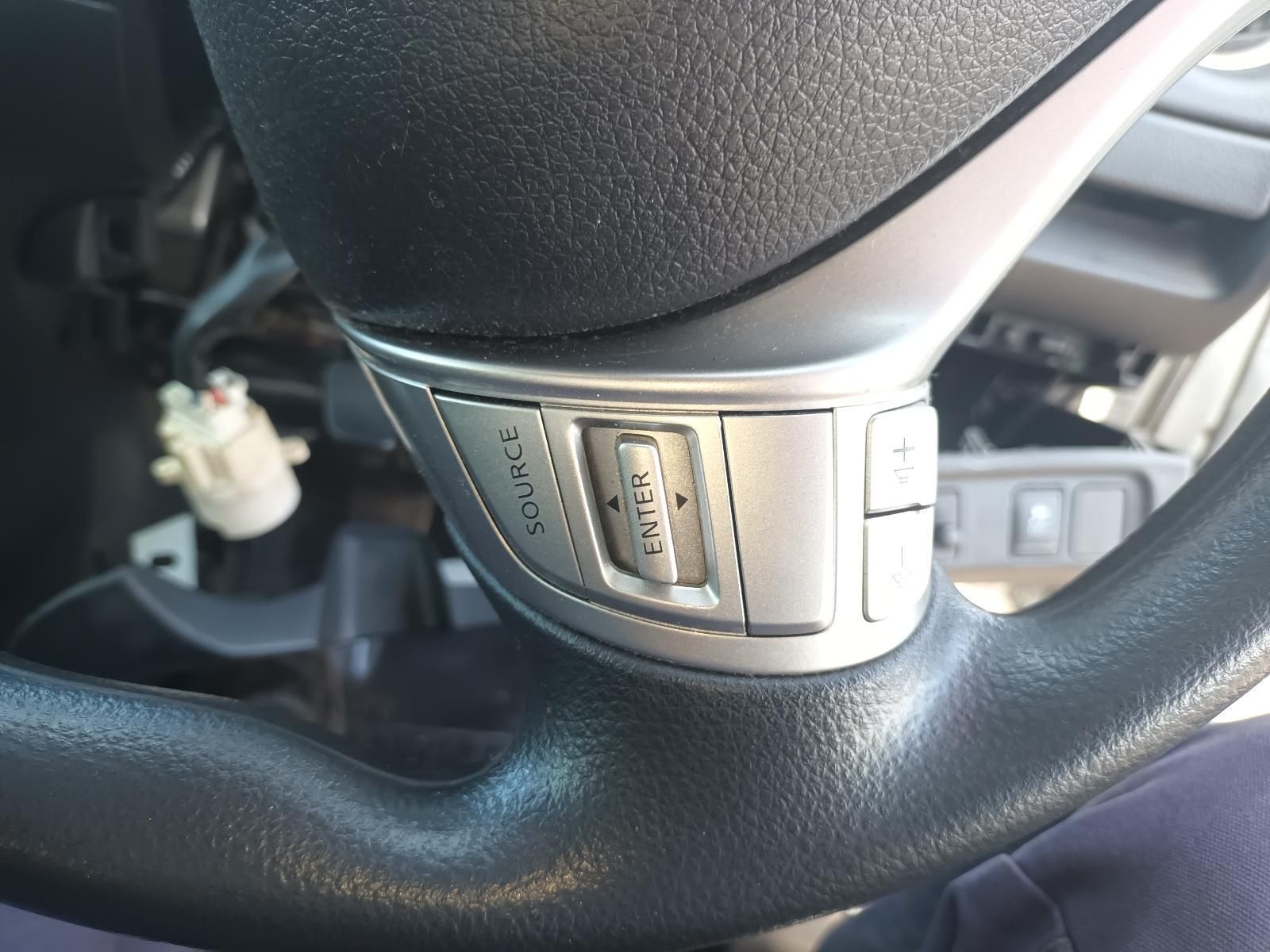 A Close Up of a Car Steering Wheel with a Button That Says Wipe — South West 4WD Wreckers In Brisbane, QLD