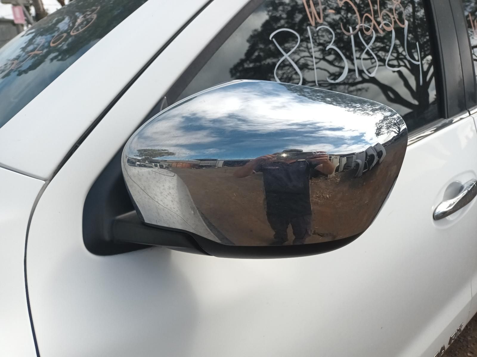 A Silver Car with a Chrome Side Mirror — South West 4WD Wreckers In Brisbane, QLD