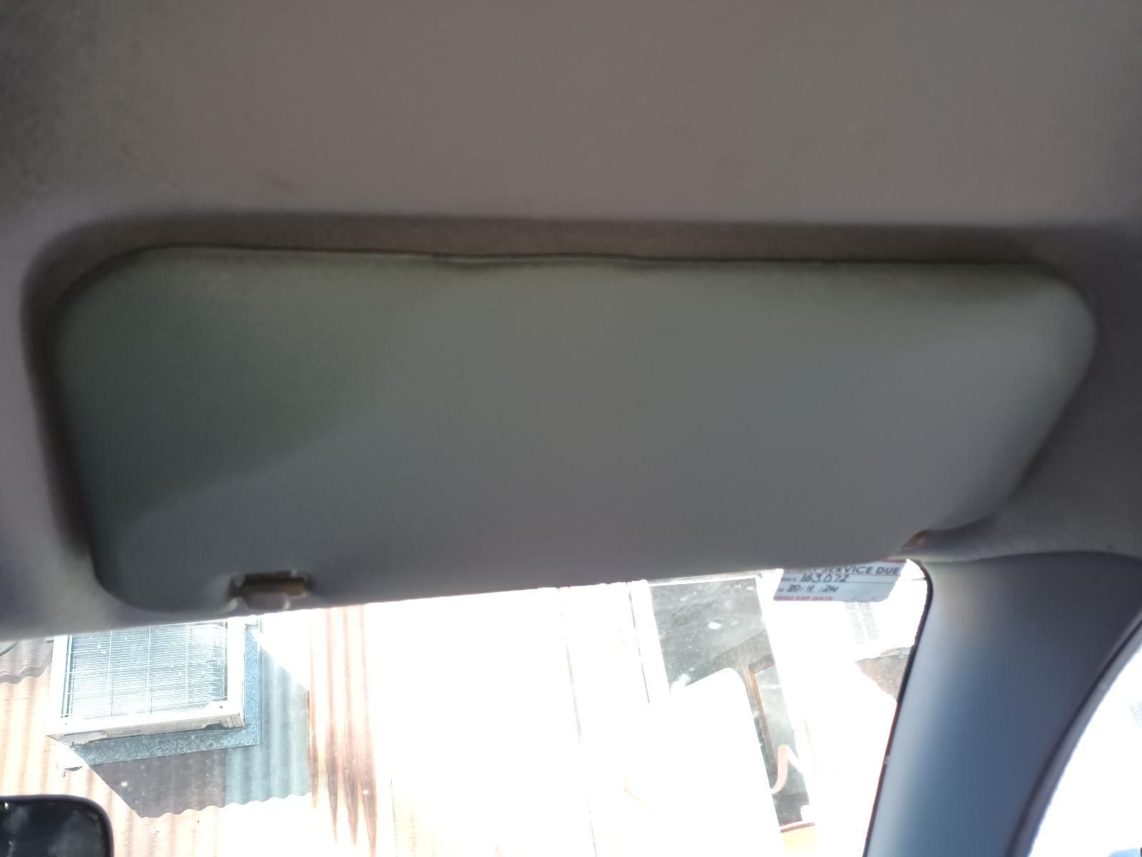 A Sun Visor is Hanging from the Ceiling of a Car — South West 4WD Wreckers In Brisbane, QLD