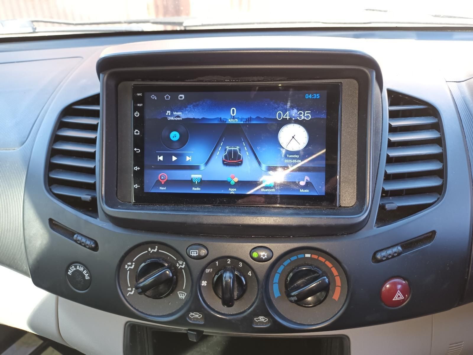 A Car Dashboard with a Radio and a Clock on It — South West 4WD Wreckers In Brisbane, QLD