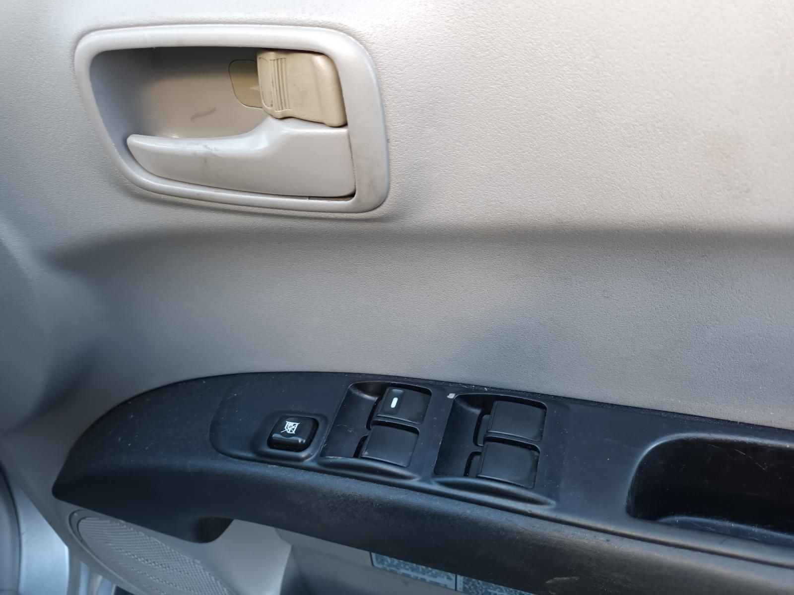 A Close Up of a Car Door with a Window Switch — South West 4WD Wreckers In Brisbane, QLD