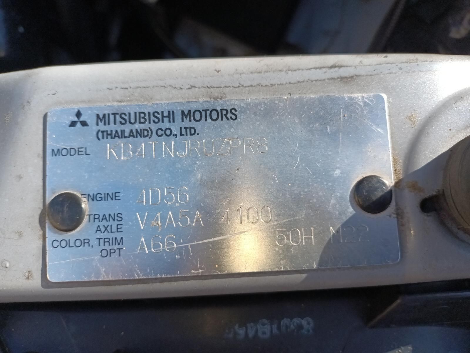 A Close Up of a Mitsubishi Motors License Plate — South West 4WD Wreckers In Brisbane, QLD