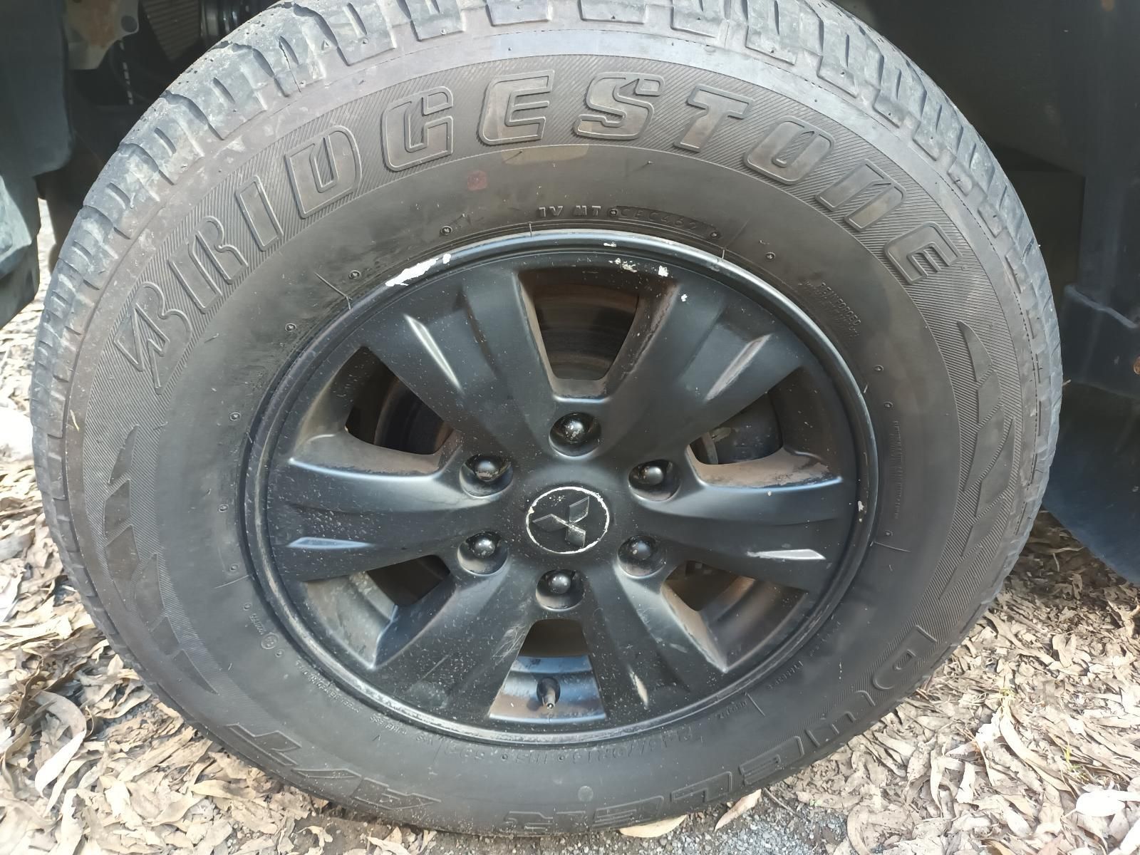 A Close Up of a Tire on a Car with a Black Rim — South West 4WD Wreckers In Brisbane, QLD