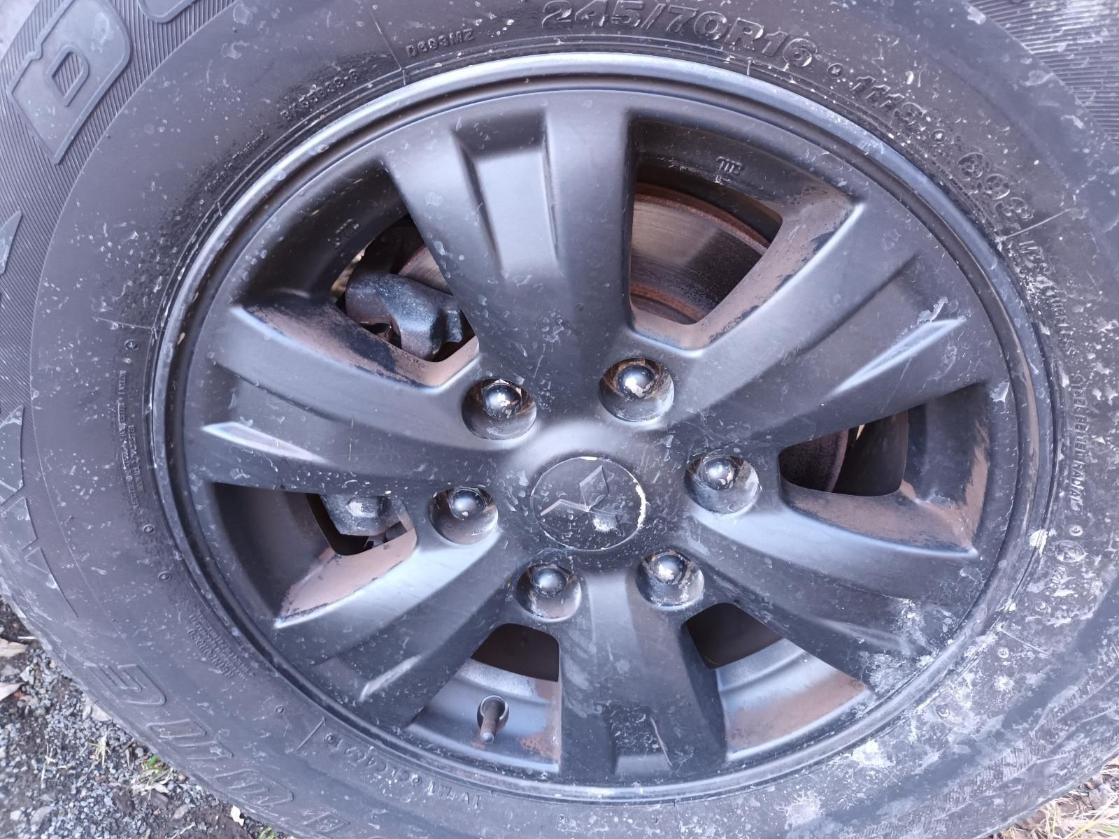 A Close Up of a Black Wheel on a Car — South West 4WD Wreckers In Brisbane, QLD