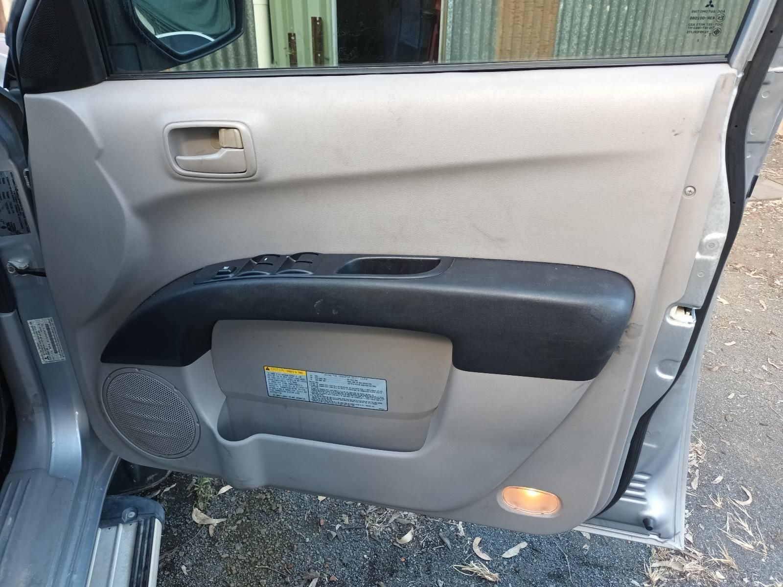 A Close Up of a Car Door with the Door Open — South West 4WD Wreckers In Brisbane, QLD