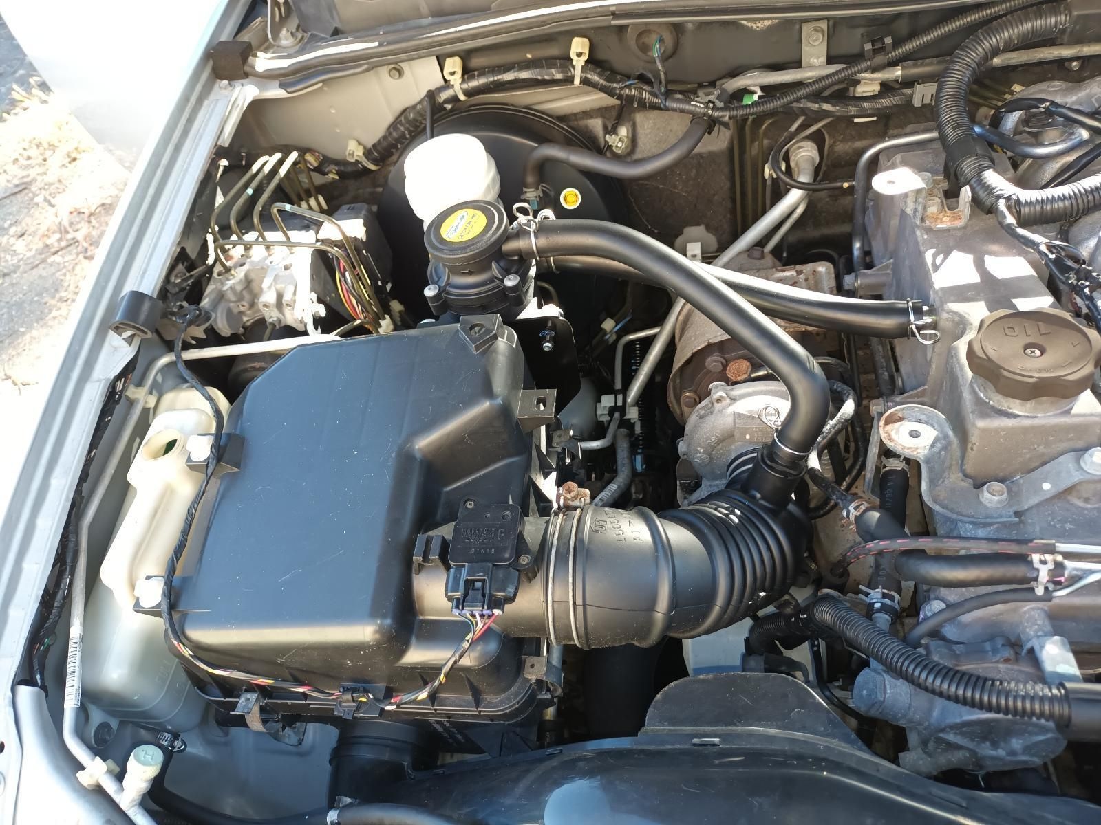 A Close Up of a Car Engine with the Hood Open — South West 4WD Wreckers In Brisbane, QLD