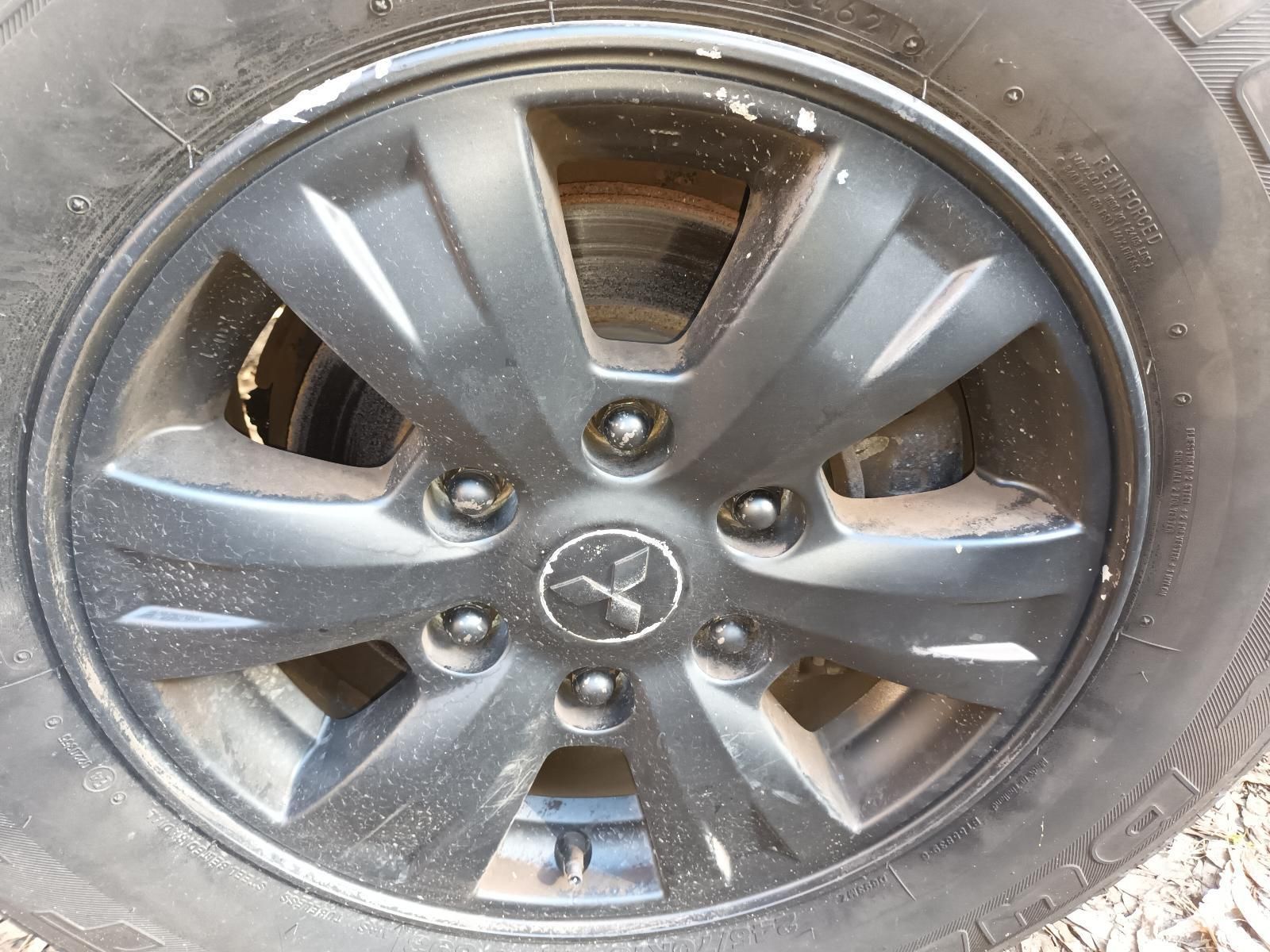 A Close Up of a Black Wheel on a Car — South West 4WD Wreckers In Brisbane, QLD