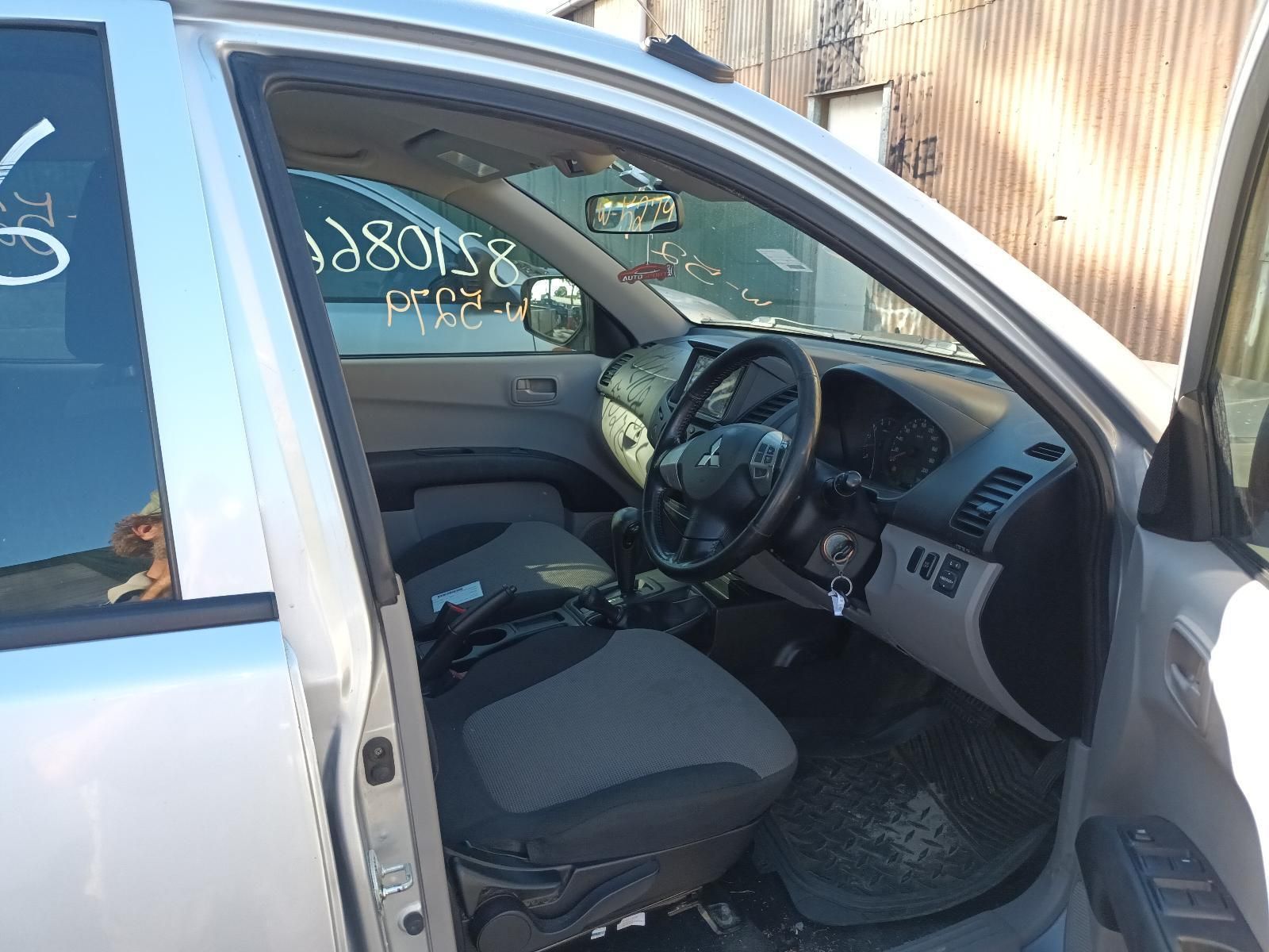 The Inside of a Silver Car with the Door Open — South West 4WD Wreckers In Brisbane, QLD