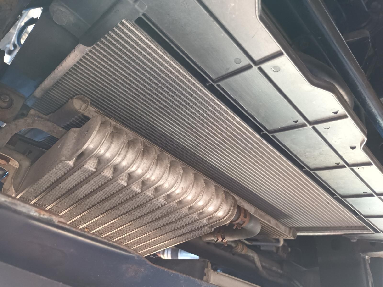 A Radiator is Sitting Underneath the Hood of a Car — South West 4WD Wreckers In Brisbane, QLD