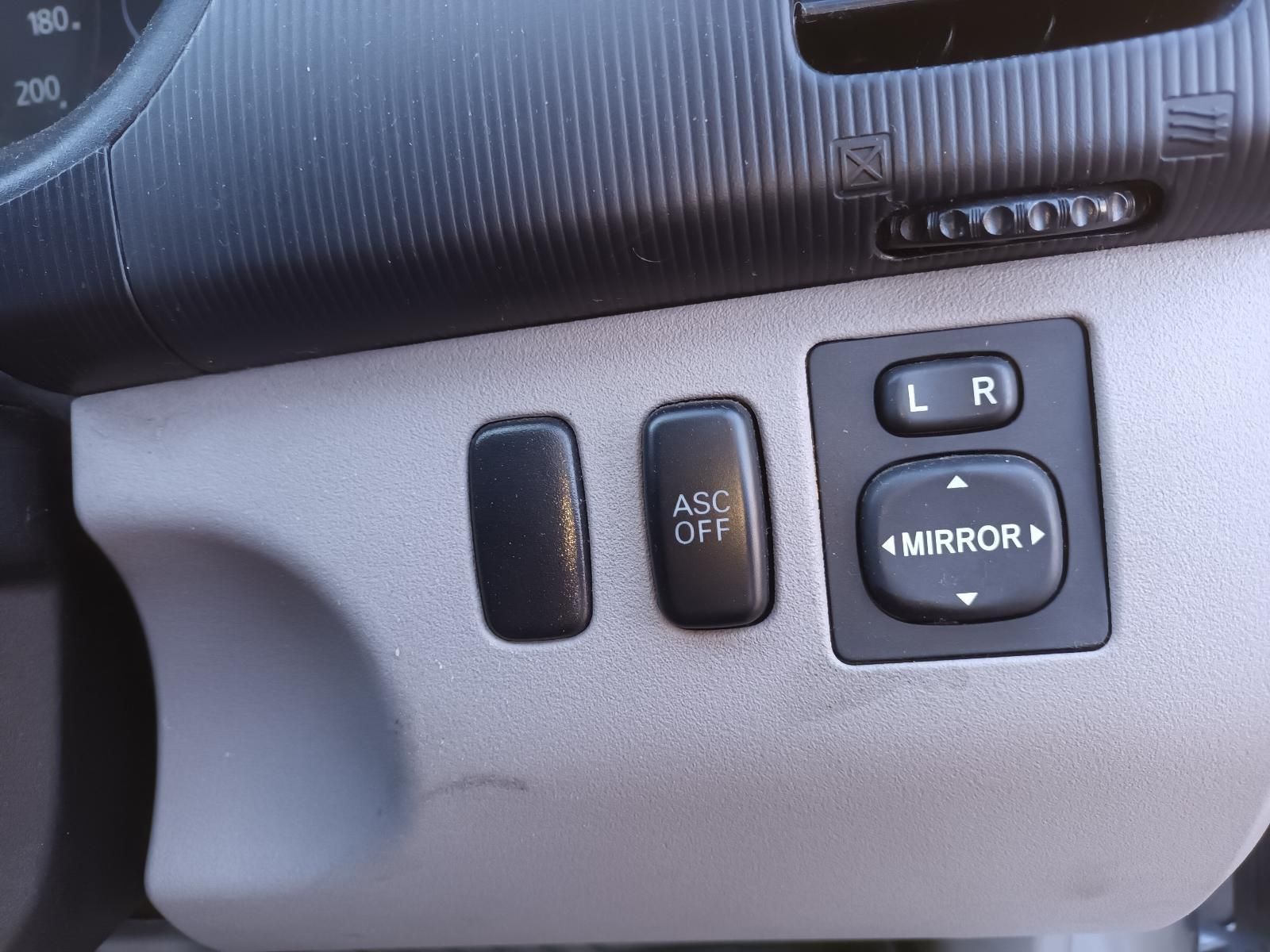 A Close Up of a Car Dashboard with a Mirror Switch — South West 4WD Wreckers In Brisbane, QLD