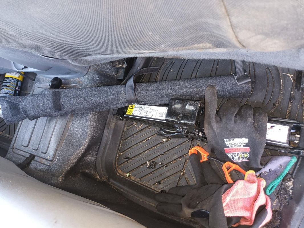 A Close Up of the Underside of a Car with Tools and a Battery — South West 4WD Wreckers In Brisbane, QLD