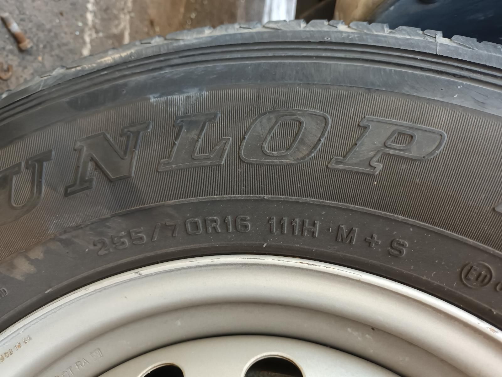 A Close Up of a Dunlop Tire on a Wheel — South West 4WD Wreckers In Brisbane, QLD
