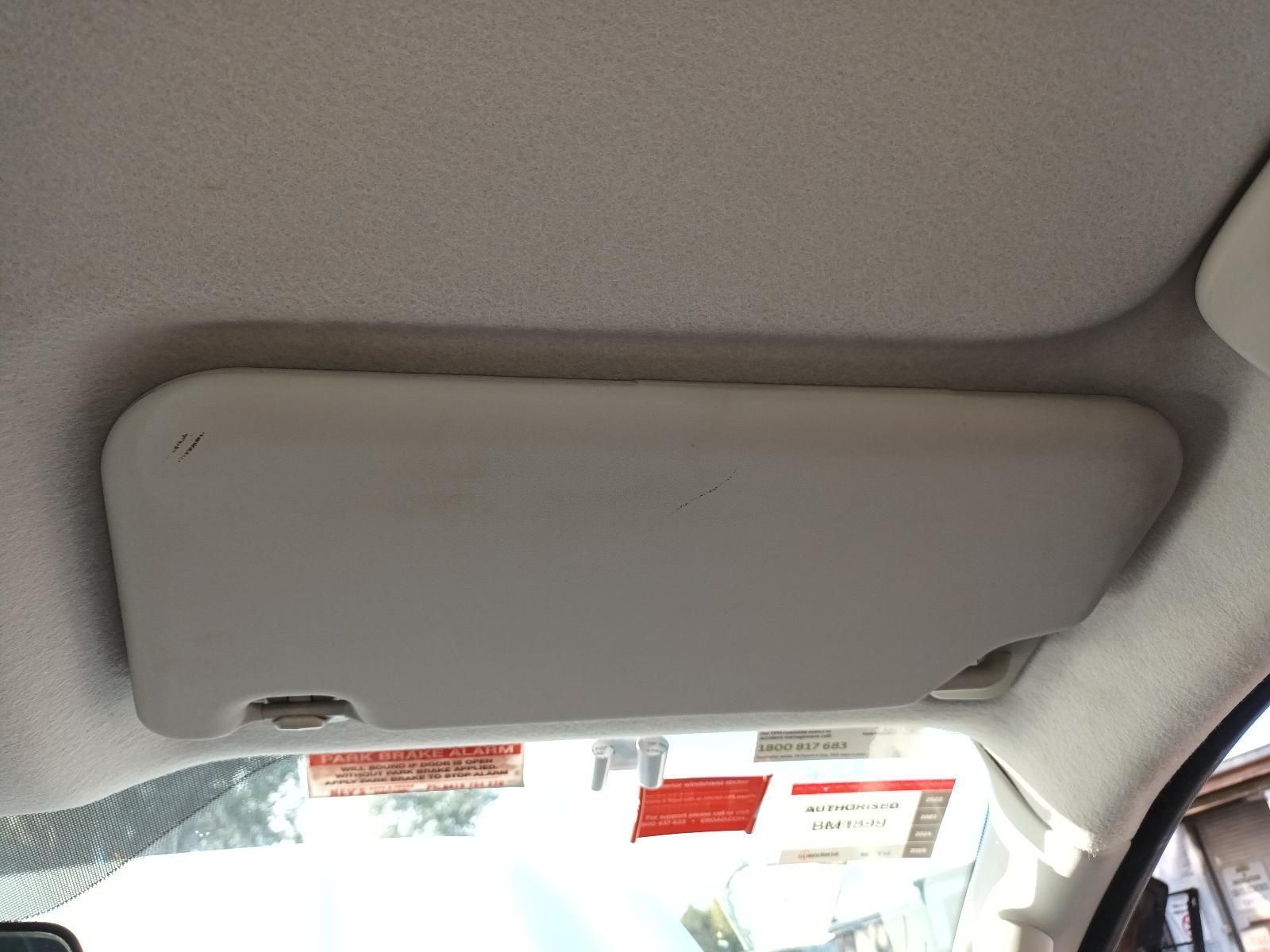 A Sun Visor is Hanging from the Ceiling of a Car — South West 4WD Wreckers In Brisbane, QLD