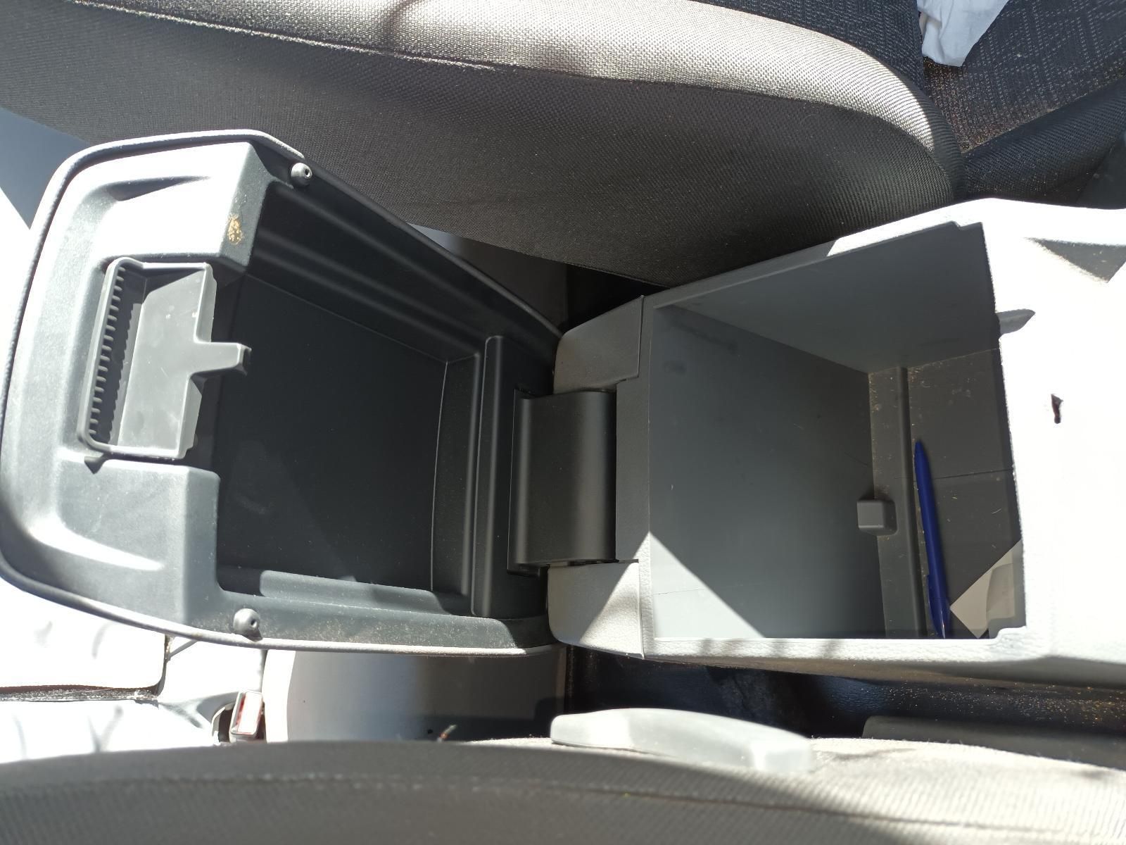 A Car Console with the Lid Open and a Pen in It — South West 4WD Wreckers In Brisbane, QLD
