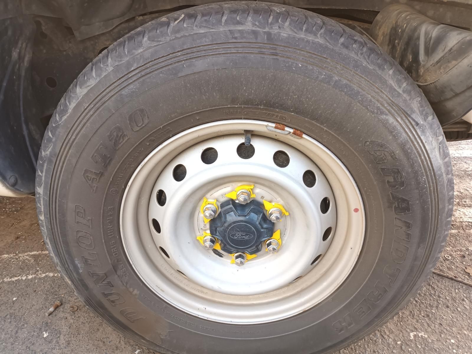 A Car Tire with a Metal Rim — South West 4WD Wreckers In Brisbane, QLD