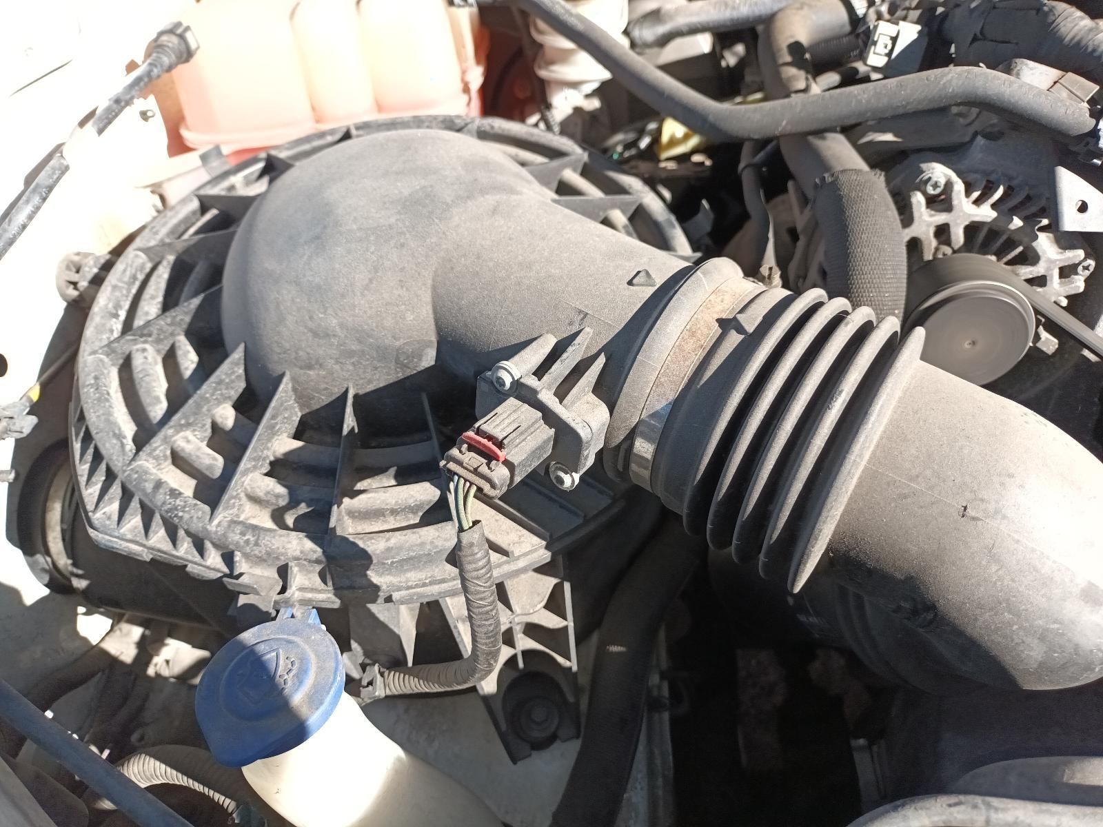 A Close Up of a Car Engine with a Hose and a Fan — South West 4WD Wreckers In Brisbane, QLD